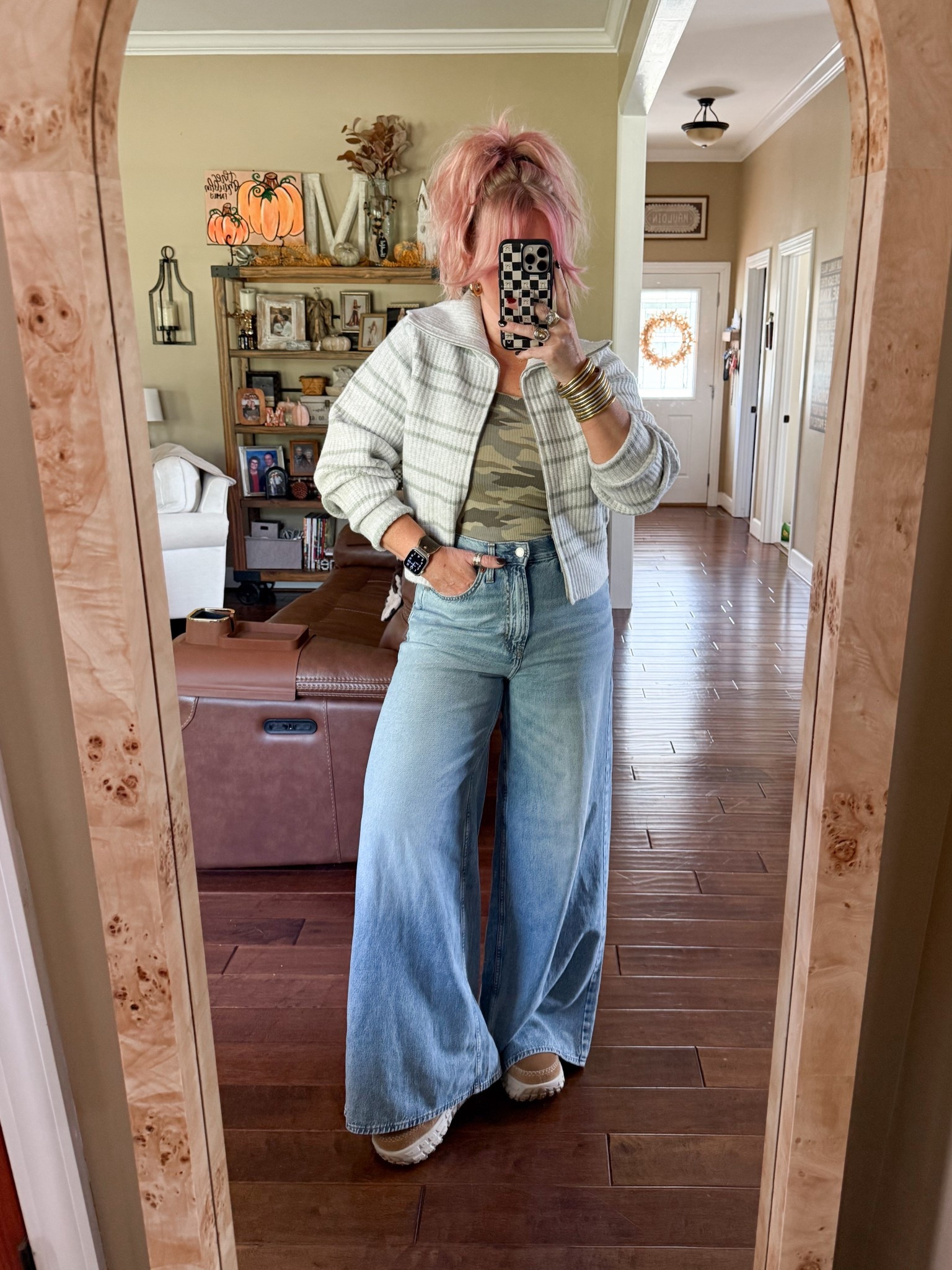 This zip up sweater is so cute! I’m wearing a medium and it comes in more colors. Love it layered over this tank. 
My jeans are a size 8. 


#LTKFindsUnder50 #LTKOver40 #LTKStyleTip