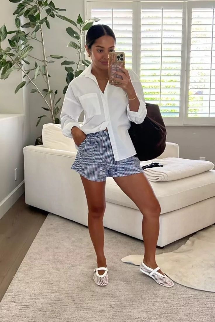 Blue striped shorts
White button down 
White mesh flats 

#LTKBeauty #LTKPetite #LTKTravel
