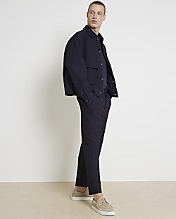 Black tapered fit plisse smart trousers | River Island (US)