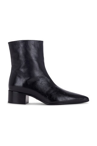 KHAITE Andee Ankle Boot in Black - Black. Size 39.5 (also in 36, 37, 38, 38.5, 39, 40, 41). | FWRD 
