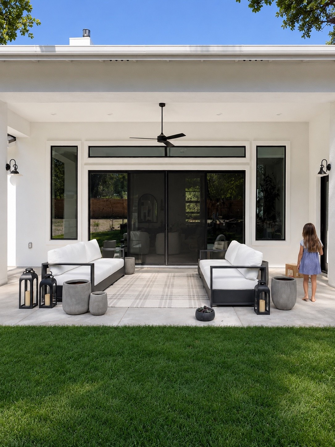 Client update 

Outdoor rug and sofas arrived. Along with planters and lanterns. 

Coffee table next along with plants.

#LTKHome