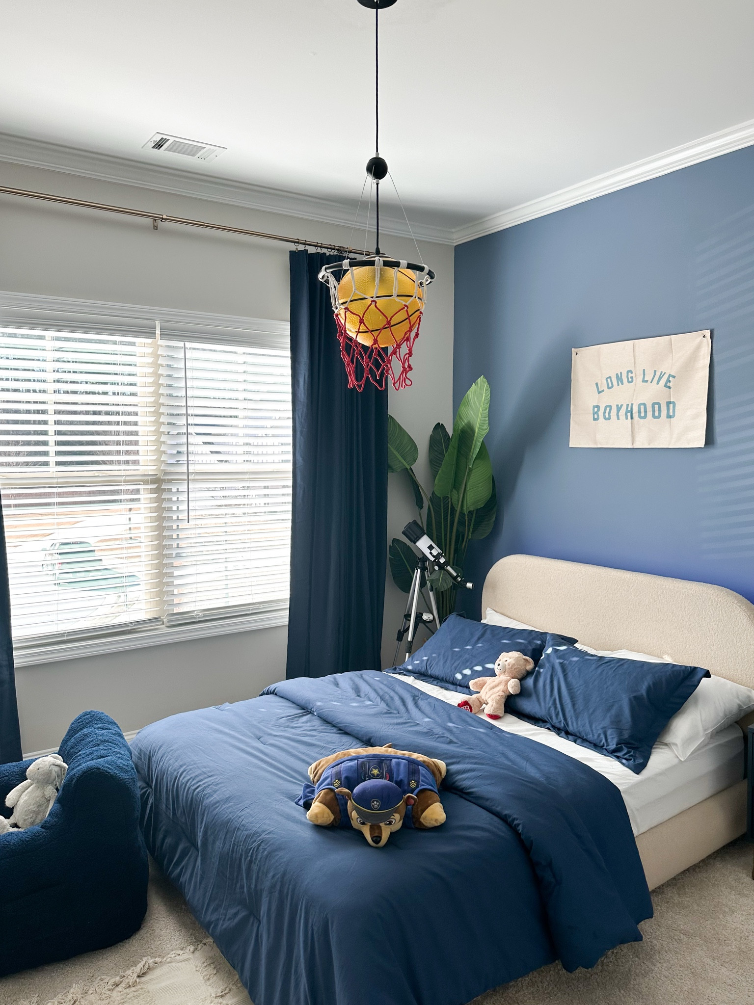 Shop Little Homebody’s big boy room. 🏀 

This basketball light fixture is the perfect addition to the space and he is loving it. 

#LTKHome #LTKKids #LTKSaleAlert