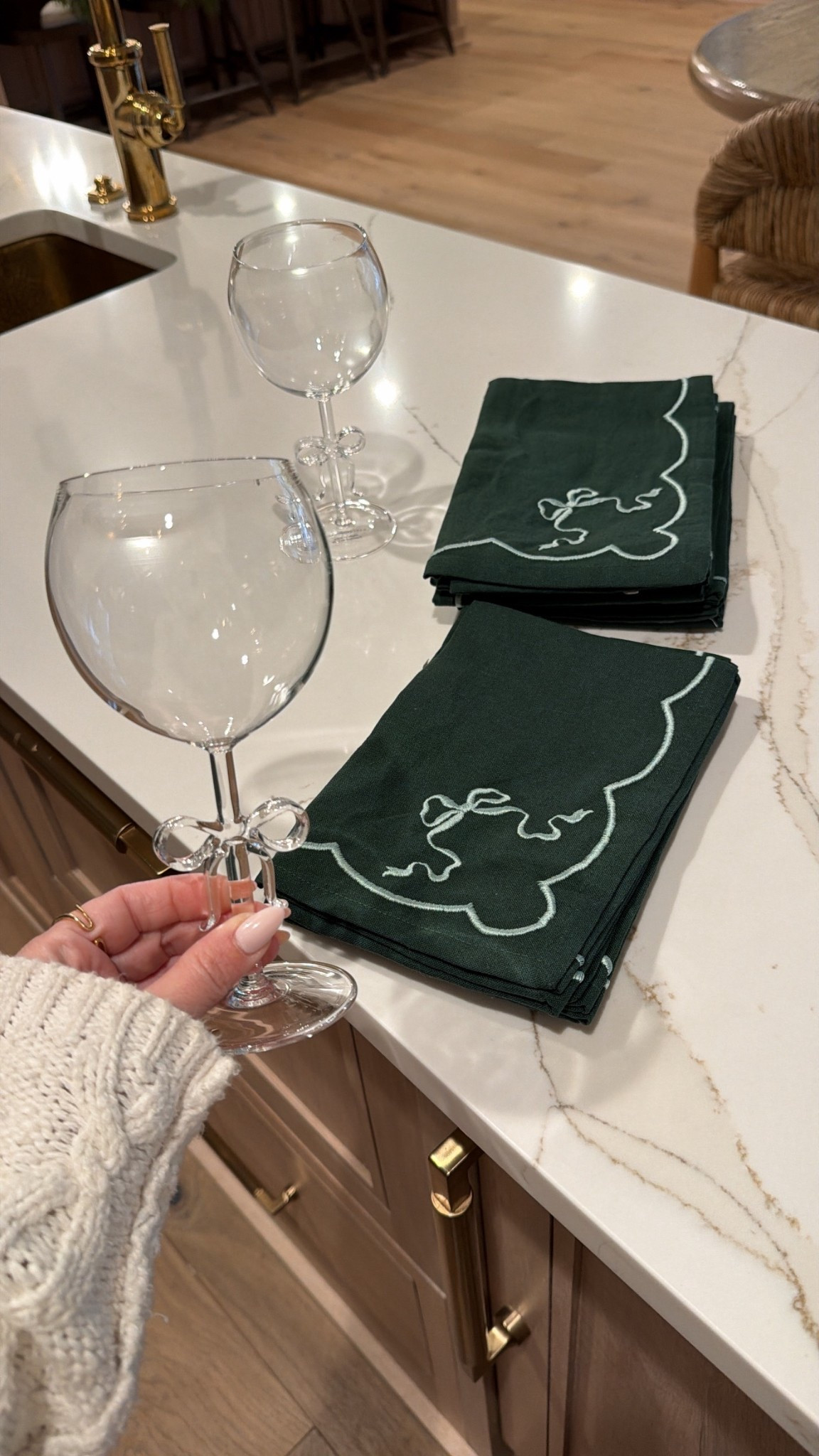 Up to 40% off holiday outfits & hosting at Anthro right now! Got these bow glasses & napkins for Christmas Eve 🎄 

#LTKHoliday #LTKSaleAlert #LTKHome