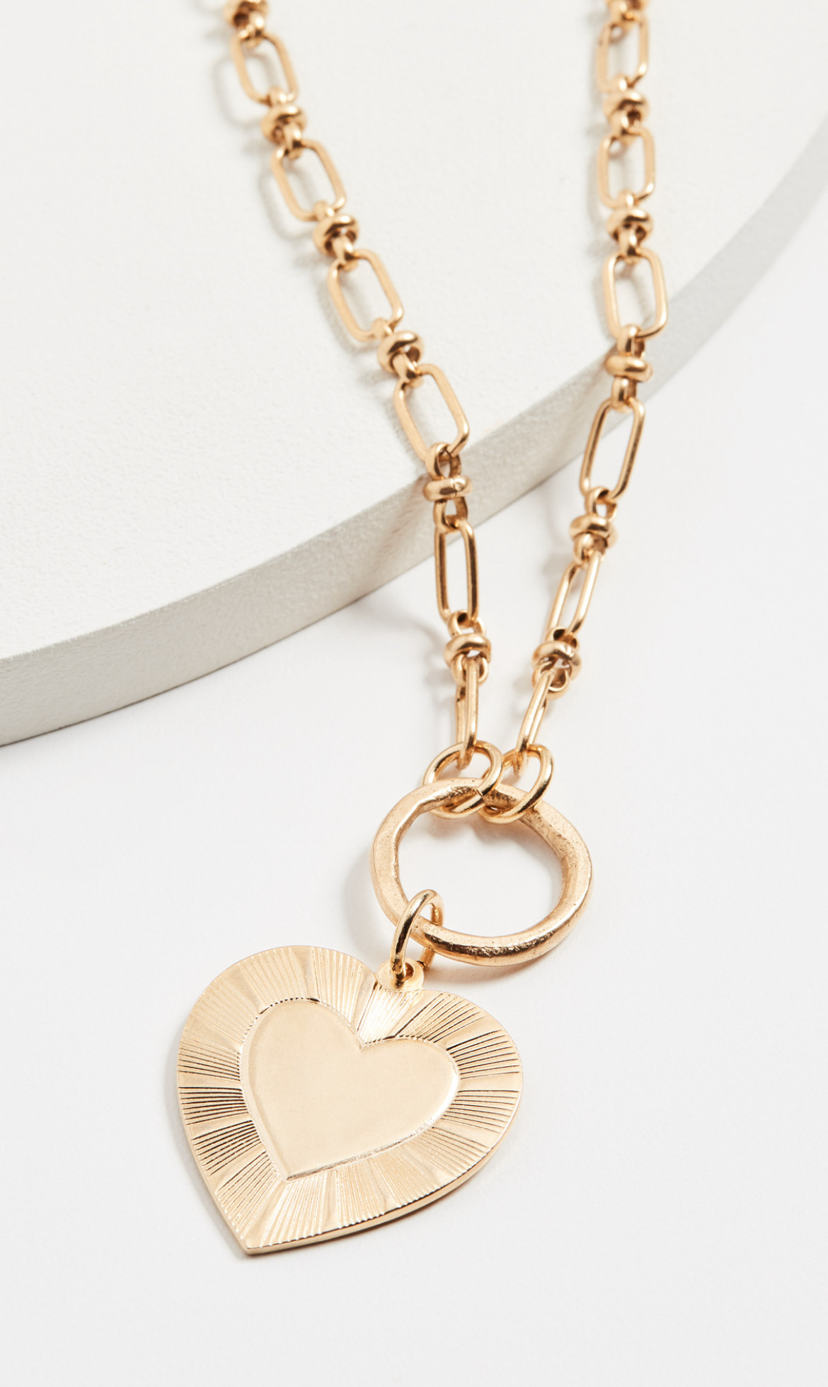 This gold heart statement necklace is absolutely precious! Pair with any outfit for a pop. Get 25% off with code HOLIDAY! Under $100!  

 #LTKCyberWeek #LTKHoliday #LTKSaleAlert