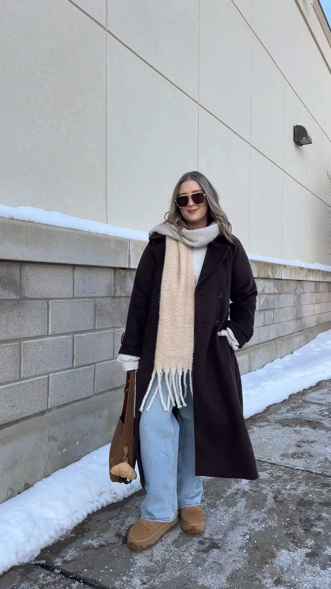 Casual winter outfit! I’m wearing my usual size L in my Abercrombie long chocolate brown wool blend coat. These are my all time fave jeans from Abercrombie, wearing 32 for a looser fit. My Ugg style platform boots are Amazon and such good quality, I’m a 9.5-10 and wear a 10. I’ve been using this suede Coach shoulder bag on repeat and it’s perfect for everyday. Linked similar scarf & sweatshirt 


#LTKsale #LTKwinter #LTKmidsize