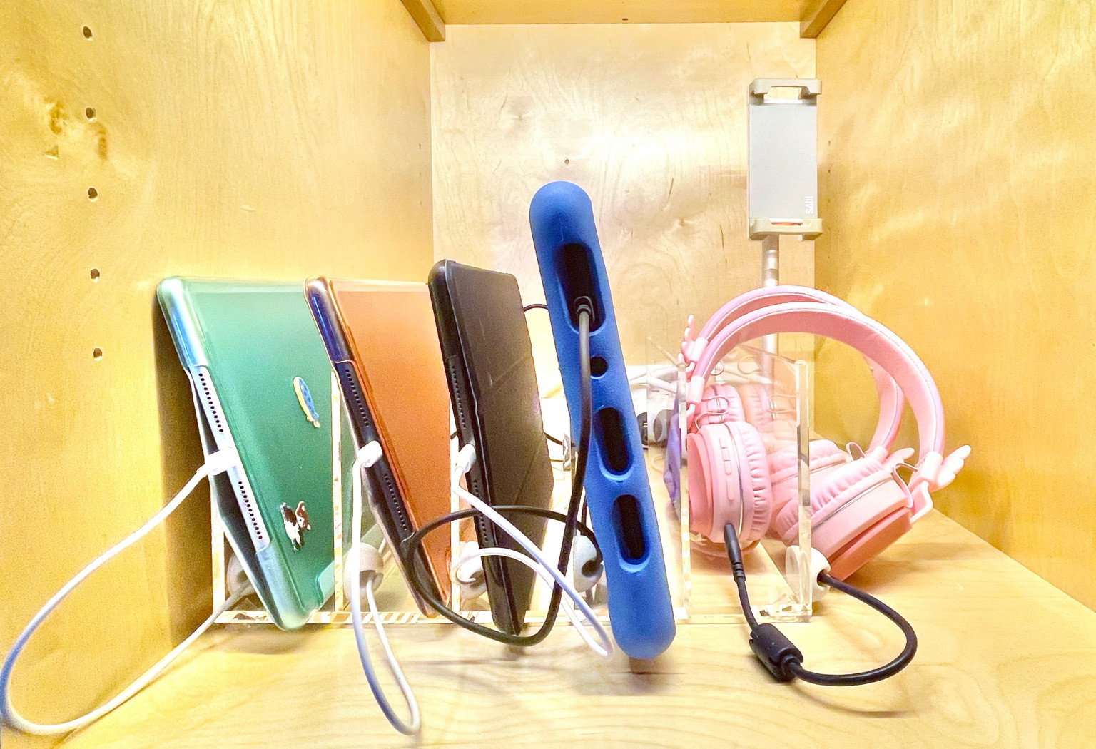 We just can’t get behind all the ugly, hard-to-actually-use (unplugging one device means you risk toppling the whole lot over) charging stations on the market. The good news is an acrylic slotted organizer is more aesthetically pleasing and more sturdy, anyhow.

#LTKfamily #LTKFind #LTKhome