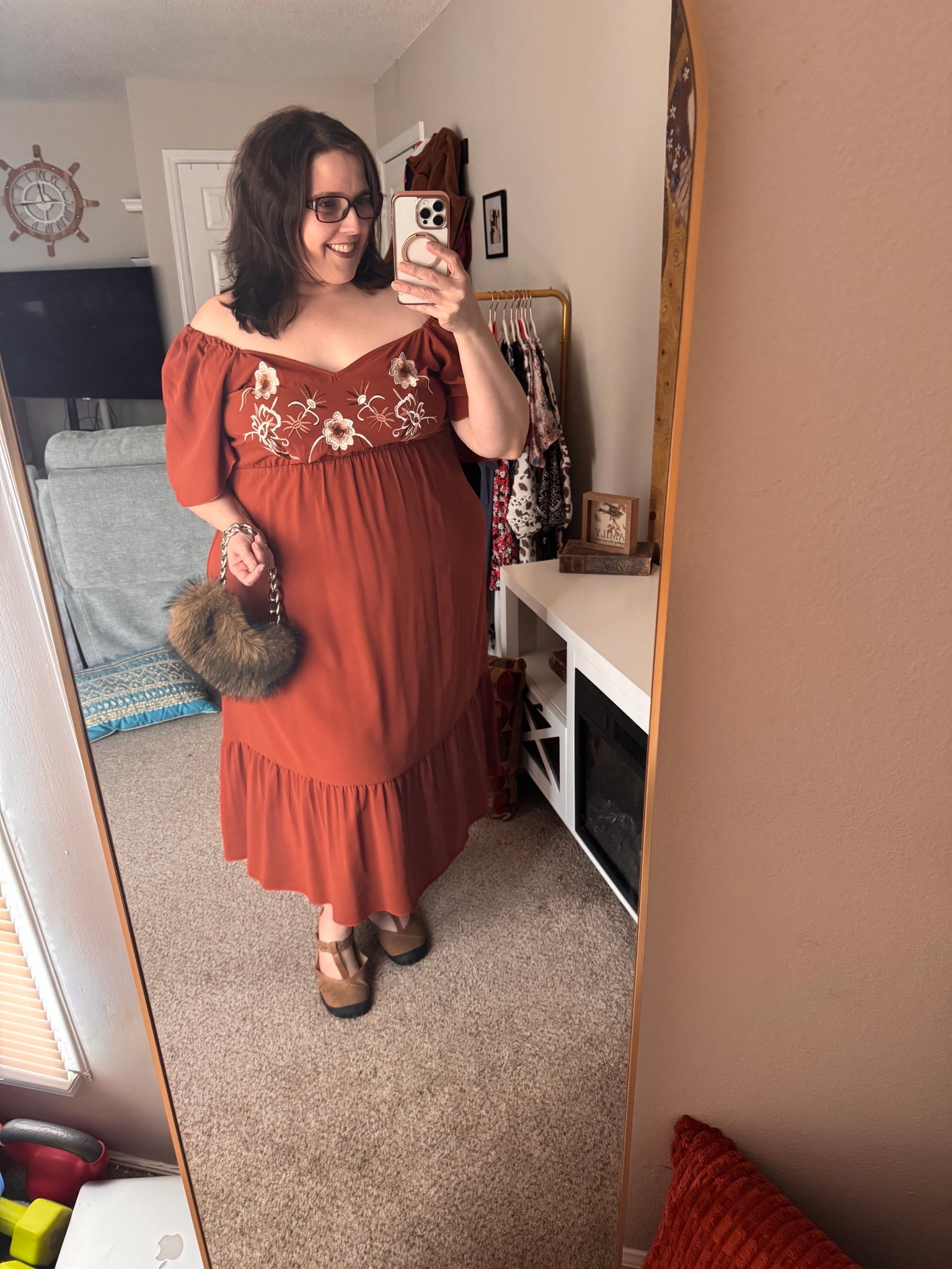 This look is giving effortless charm with a touch of vintage romance. The warm rust-toned dress features delicate floral embroidery across the bodice that adds such a beautiful, feminine detail. The off-the-shoulder neckline creates a soft, flattering silhouette while the flowy skirt keeps the look comfortable and easy to wear all day.

I paired it with cozy neutral platform Mary Jane shoes from Jambu, which add height and stability while still being incredibly comfortable for walking. The chunky sole and crisscross straps give them that perfect mix of vintage charm and everyday practicality.

To finish the look, I added a playful faux-fur mini bag for texture and a little personality.

It’s one of those outfits that feels relaxed but still put together — perfect for brunch, casual outings, or any day you want to feel confident, comfortable, and a little romantic.

#LTKOver40 #LTKPlusSize #LTKootd