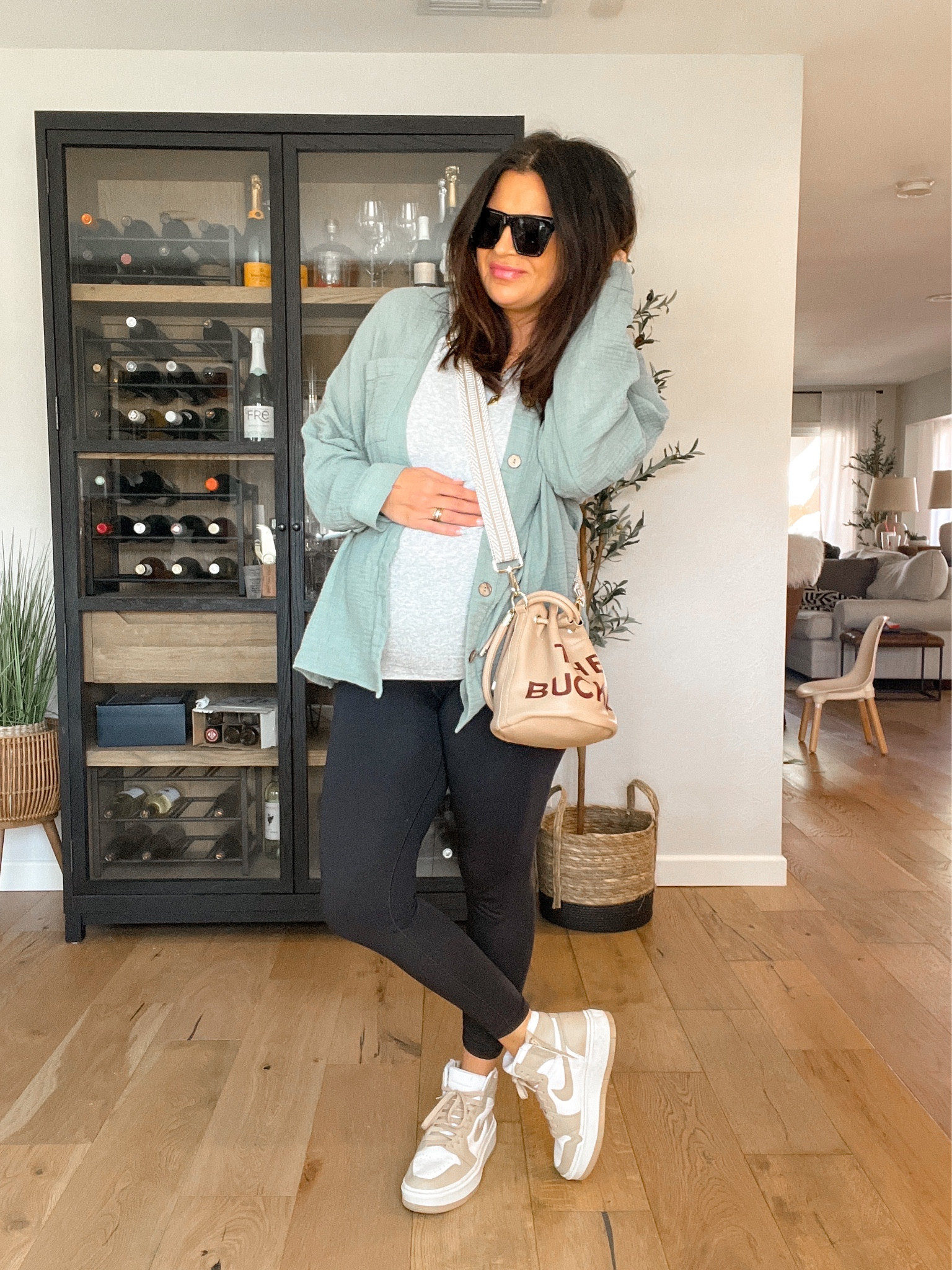 Bump friendly outfit, on the go mom outfit, maternity style 

Gauze shirt: XL: (BWC20)
Tank: XL
Leggings: Large
Sneakers: TTS
BAG, strap, and sunnies are Amazon  

#LTKstyletip #LTKshoecrush #LTKunder50