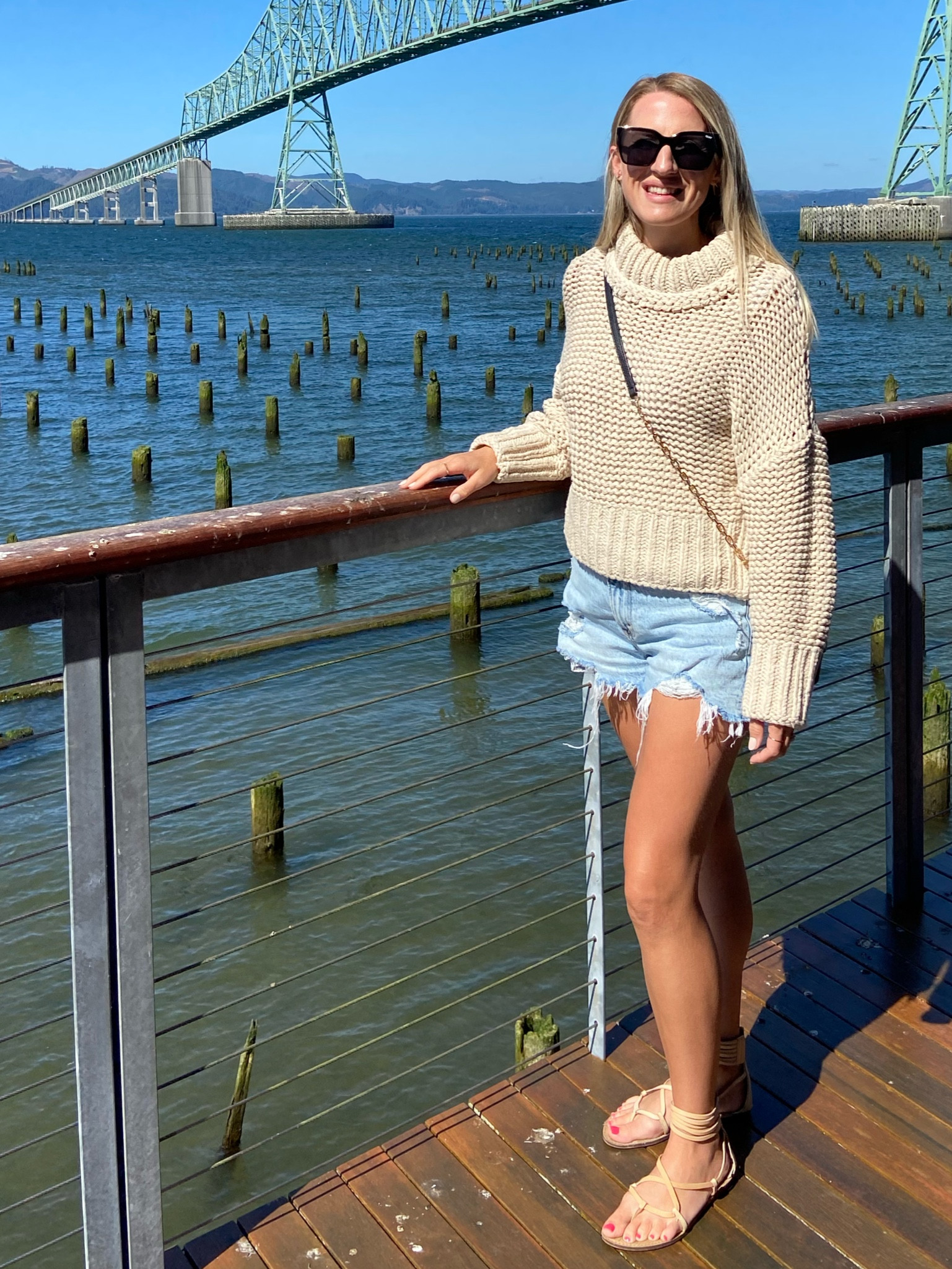 Chunky free people sweater, jean shorts and sandals are the perfect fall outfit!

#LTKstyletip #LTKunder100 #LTKsalealert
