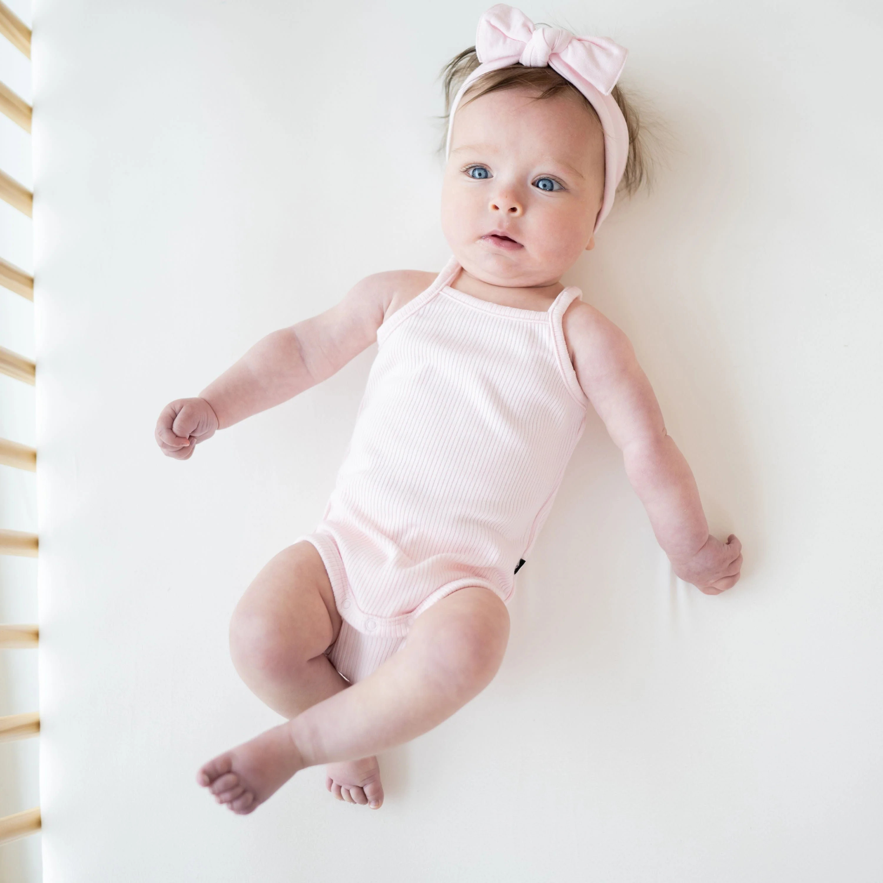 Ribbed Spaghetti Strap Bodysuit in Sakura | Kyte BABY