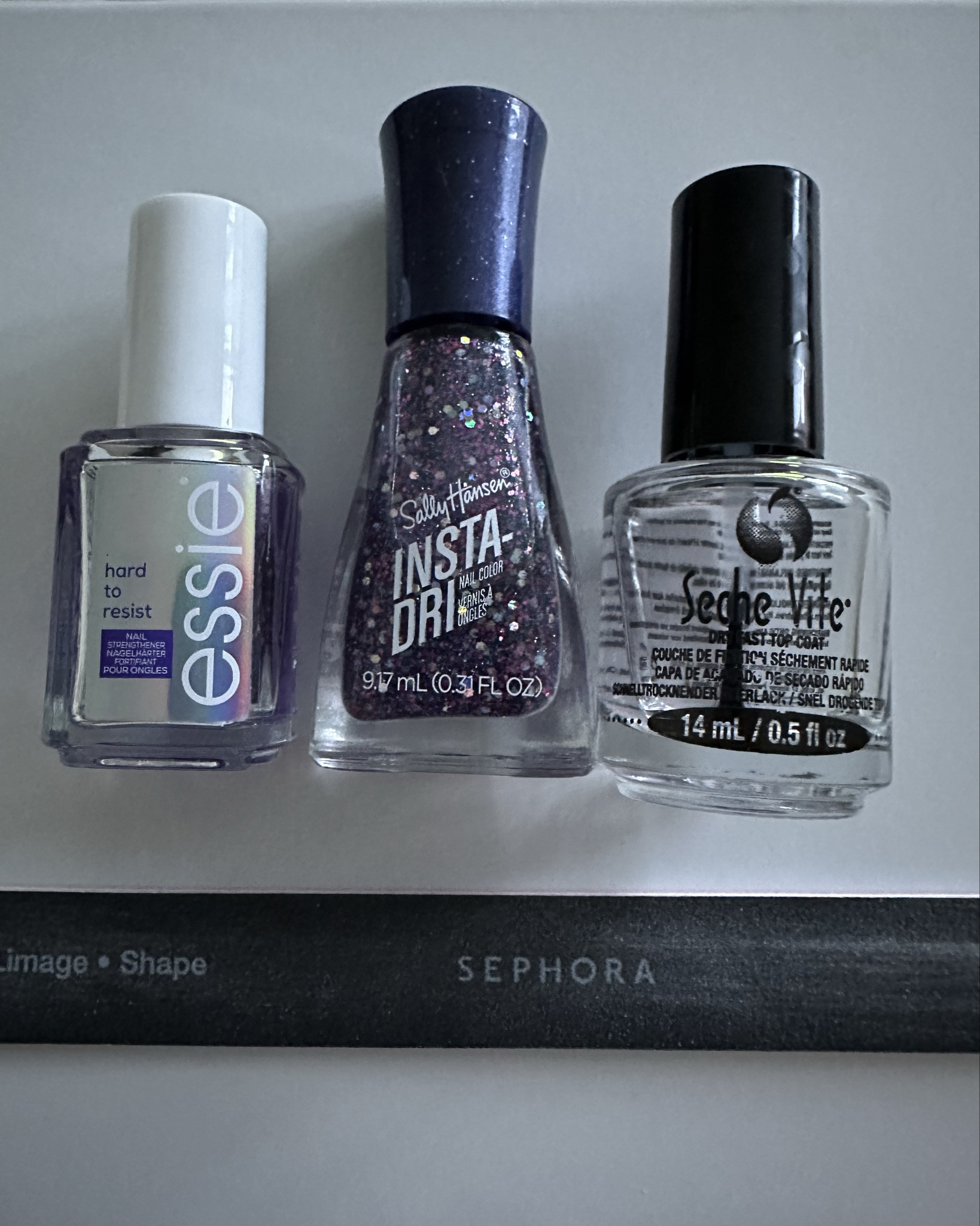Life is too short to have boring nails! 💖💅

1. Essie Hard to Resist Nail Strengthener - A nail strengthener, brighter and neutraliser.
2. Sally Hansen Insta-Dri Nail Colour in Grape Shifter - A quick-dry nail polish in a sparkly purple shade.
3. Seche Vite Dry Fast Top Coat - A fast-drying top coat.
4. Sephora Nail File - Nail file.

#NailPolish #NailArt #Manicure #NailCare #Essie #SallyHansen #SecheVite #NailStrengthener #GlitterNails #NailTopCoat #Instanails #Sephora #BeautyProducts #NailInspo #NailGoals #NailRoutine #NailAddict #NailsOfInstagram #NailLove #PolishUp #NailDesign #NailFashion #NailTrends #NailArtDesign #NailArtists #NailIdeas #NailObsessed #CreativeNails #NailStyle #NailBeauty #NailPolishAddict #NailTastic #NailPro #NailInspoDaily #PolishedPerfection #NailFie #NailPriority

#LTKuk #LTKbeauty #AugustBrandSpotlight