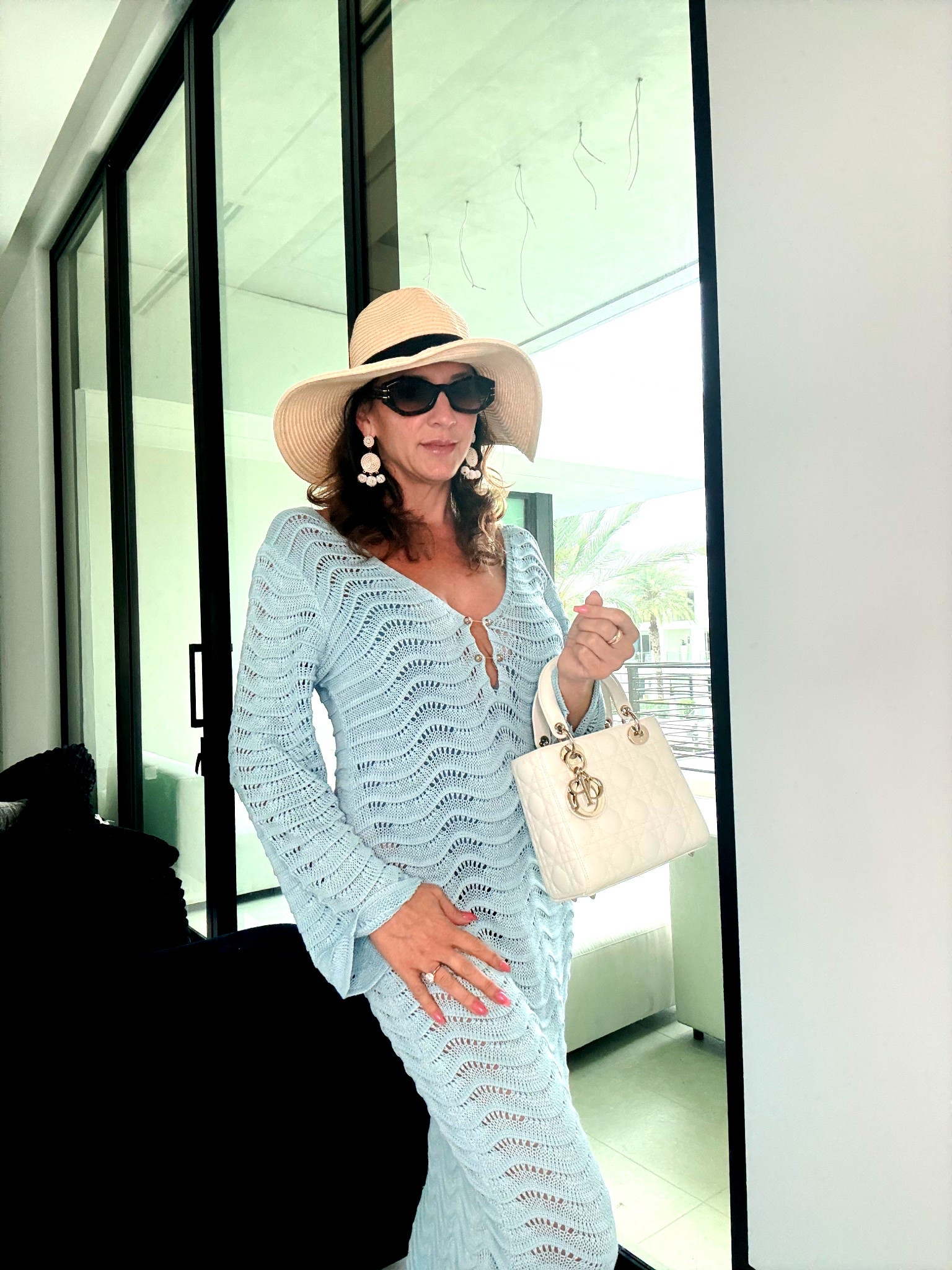 Classy beach vacation style! 
Loving this blue knit cover up! 

#LTKTravel #LTKSwim #LTKSeasonal