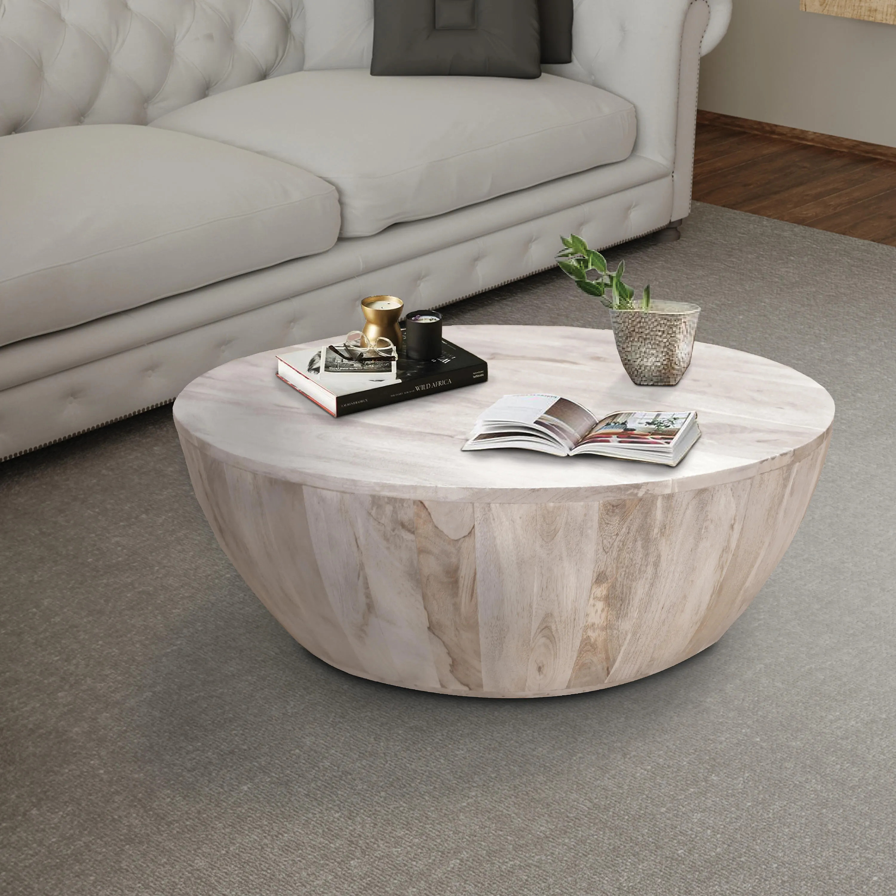 The Urban Port Round Coffee Table | Ashley | Ashley