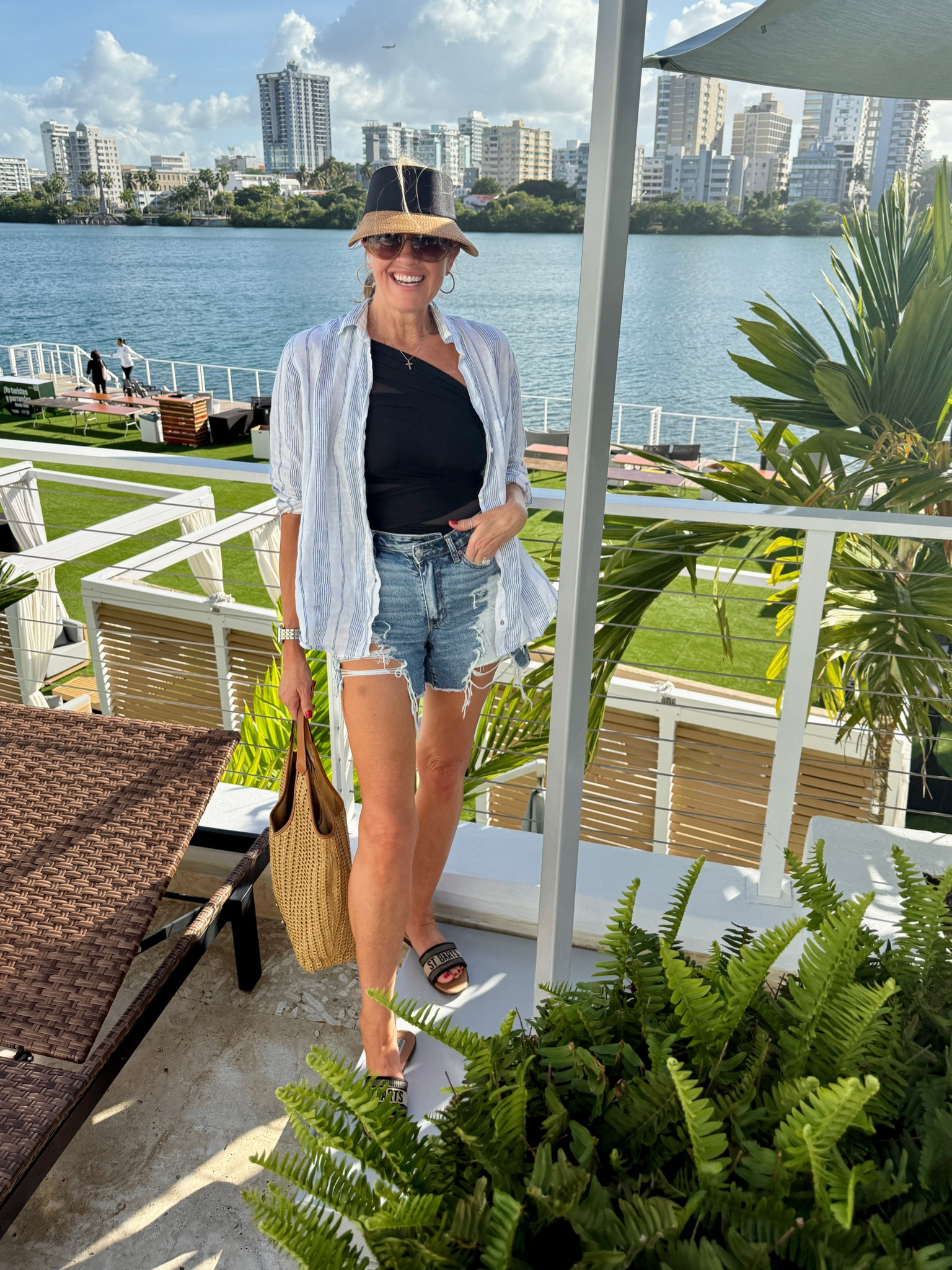 Heard somewhere warm?

Poolside and quick bite to eat

One shoulder  black swim suit by miracle suit fits tts and so flattering

American eagle denim short fits tts wearing a 27 

Steve Madden st barts slides 

🚨30% off certain items… 
Eric Jervis 🚨hat on sale and straw bag.. two of my warm weather pool/beach essentials! 

Versace sunglasses 

Greyson linen shirt (not linkable) linked similar 

#LTKSwim #LTKStyleTip #LTKTravel