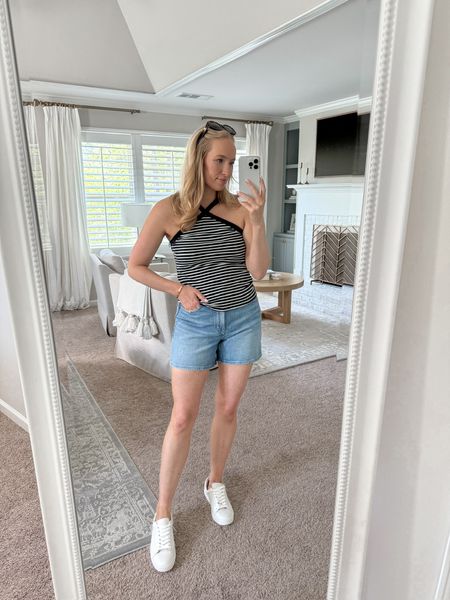 Really loving this top from Walmart! Wear it casually with denim shorts and tennis shoes or dress it up with white pants and sandals! Wearing size small in the top and size 27 in the shorts. Spring outfits // summer outfits // casual outfits // festival outfits // vacation tops // Walmart finds // Walmart fashion // denim shorts // white tennis shoes 

#LTKFestival #LTKstyletip #LTKSeasonal