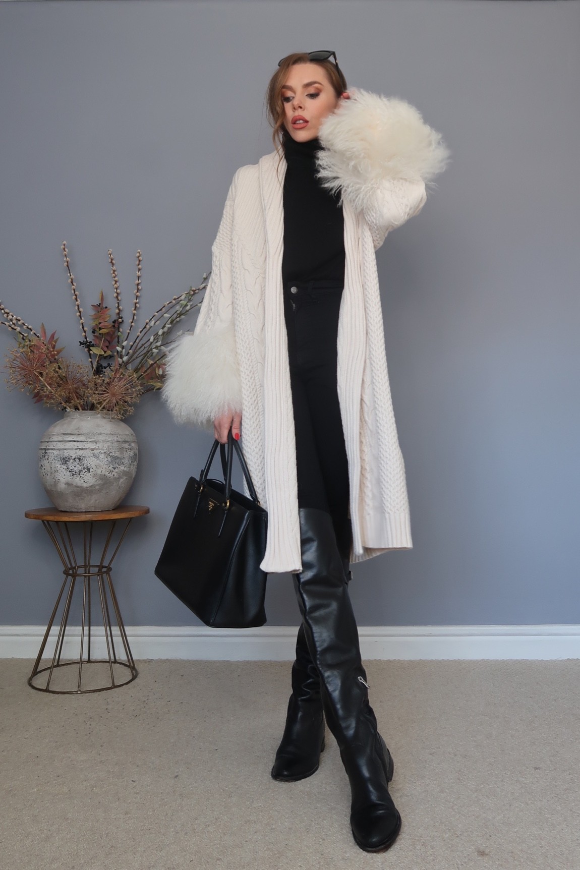 Karen Millen feather sleeve cable knit cream cardigan 

#LTKeurope #LTKstyletip #LTKSeasonal