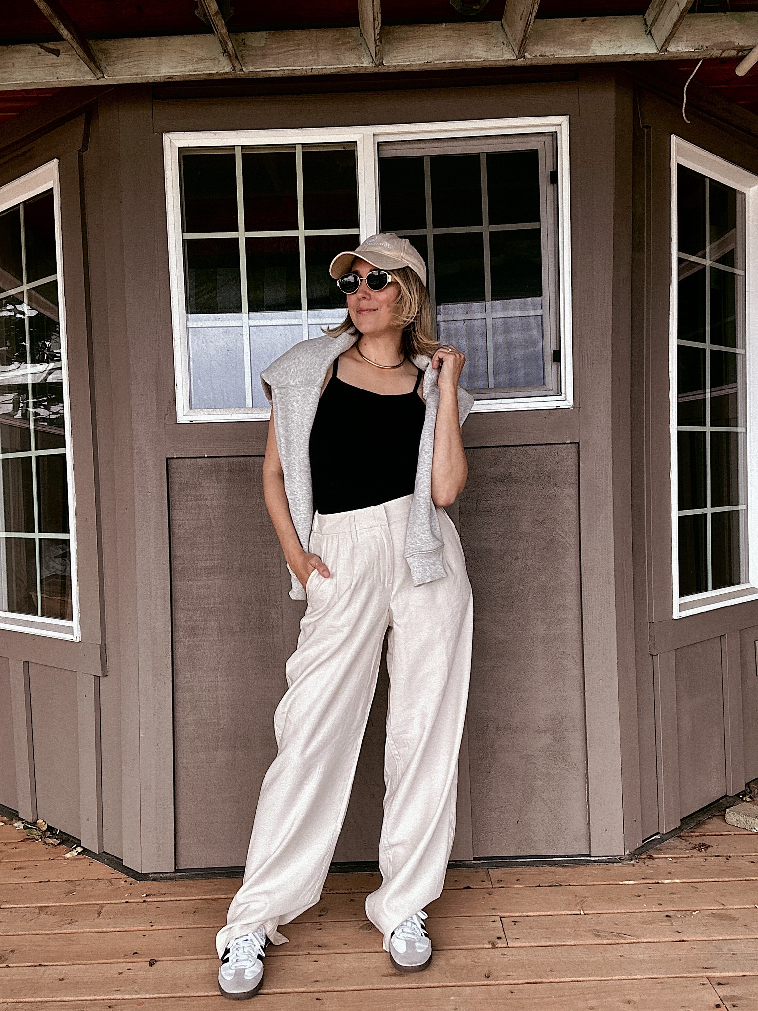 I sized up in this tank since it’s on the cropped size and on the small side. Wearing a large in the tank, XS in the sweatshirt and a size 2 in the trousers. 