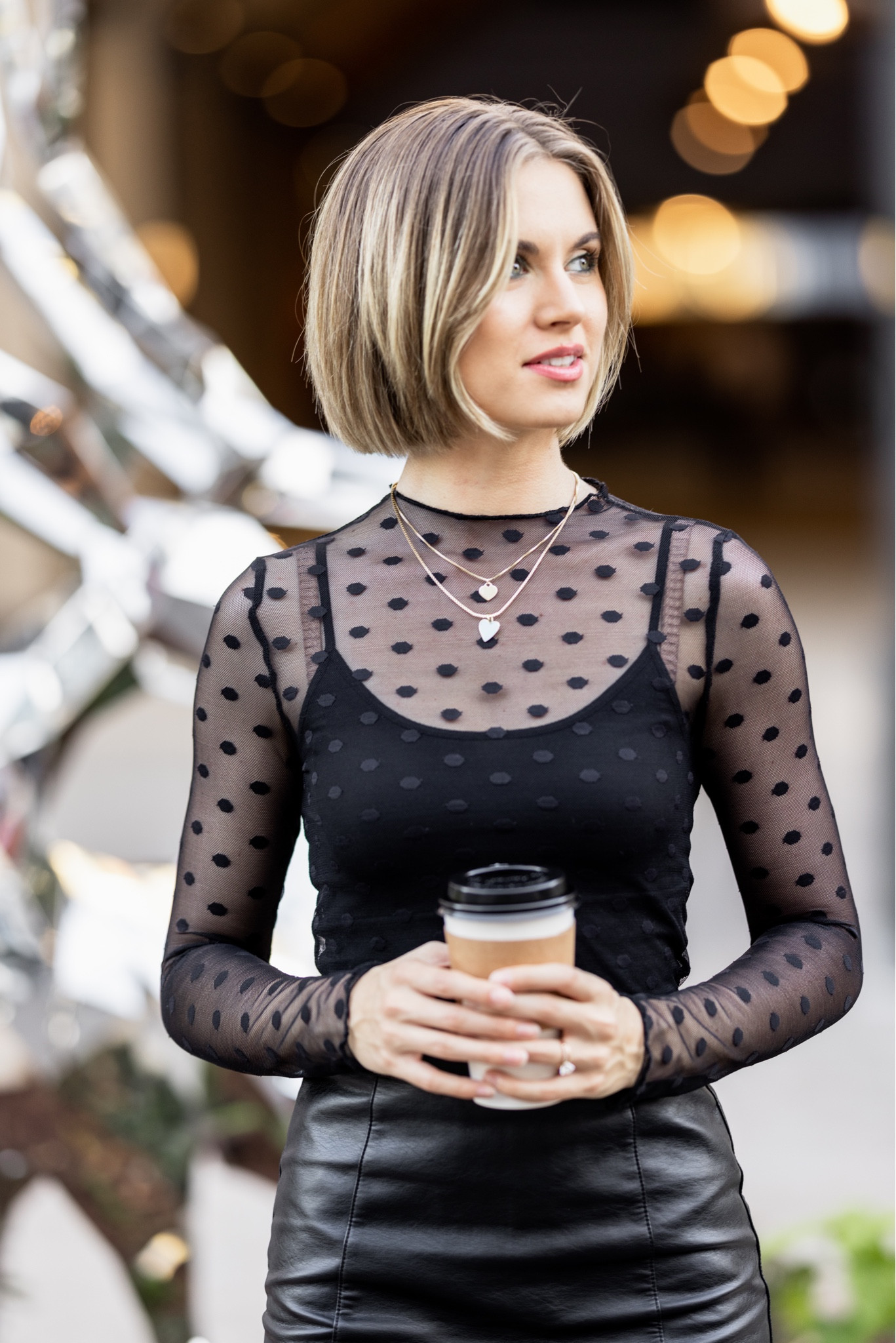 Winter holiday season outfit
Sheer polka dot 90s top: size XS
Black faux leather mini skirt: size XS
Black tights: size XS
90s platform Mary janes: size 7US 

#LTKHoliday #LTKSeasonal #LTKFind