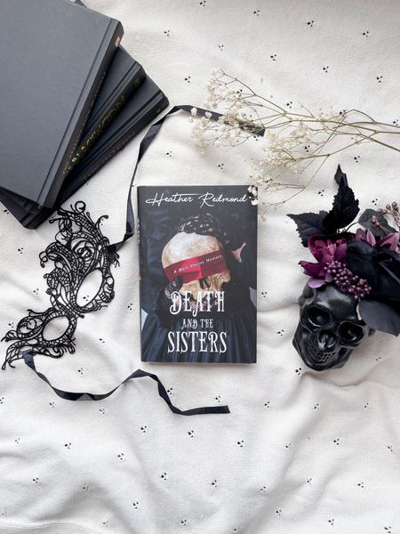 Spooky season books! Death and The Sisters by Heather Redmond. 

#LTKGiftGuide #LTKSeasonal #LTKHalloween