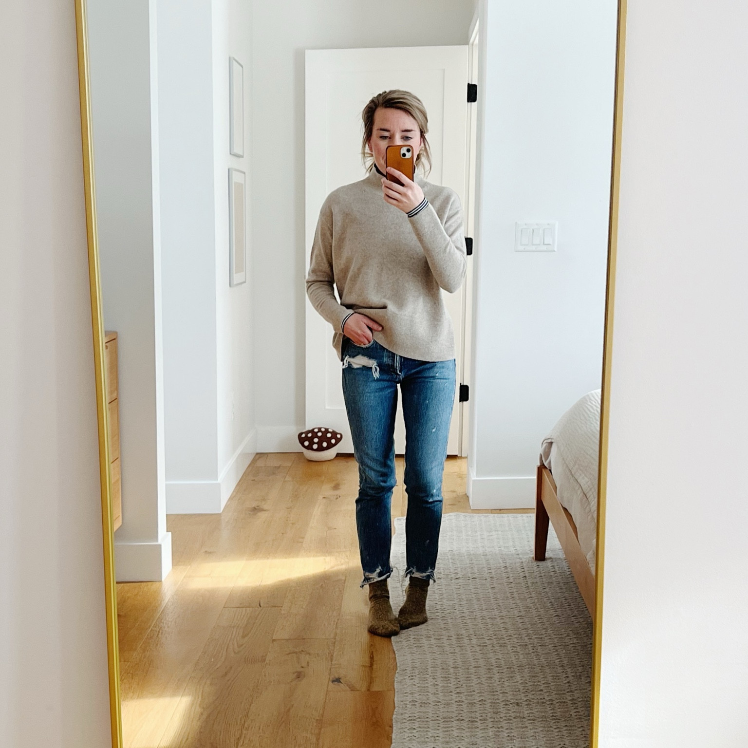 Sweater is several years old from Everlane and no longer sold, but I believe it was called the Cashmere Boxy Turtleneck. Still a favorite  