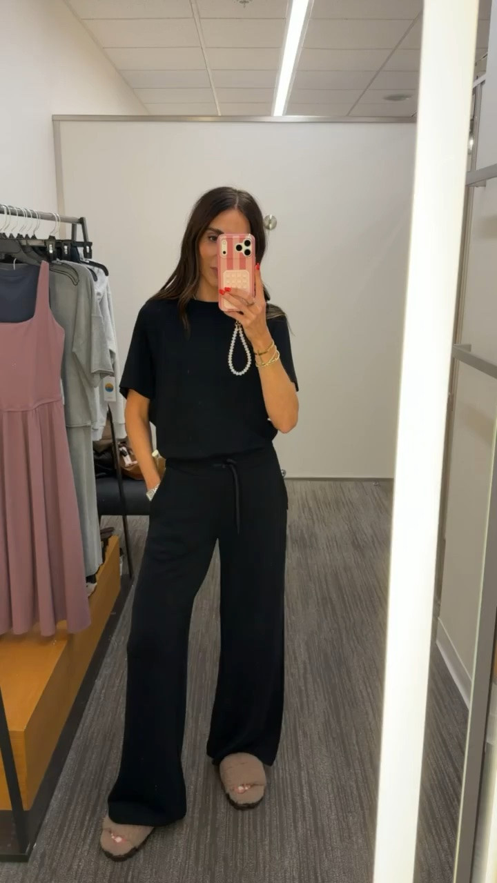 This set is exactly what I want to wear on travel days and slow weekends at home. The fabric is buttery soft, the wide leg pants drape so well, and wearing it as a matching set makes it look much more elevated than your typical lounge outfit.

S pants, XS top

matching lounge set, travel outfit, airport style, black matching set, wide leg pants, comfy outfit, loungewear, everyday essentials, elevated casual, annabrstyle

#LTKootd #LTKOver40 #LTKTravel