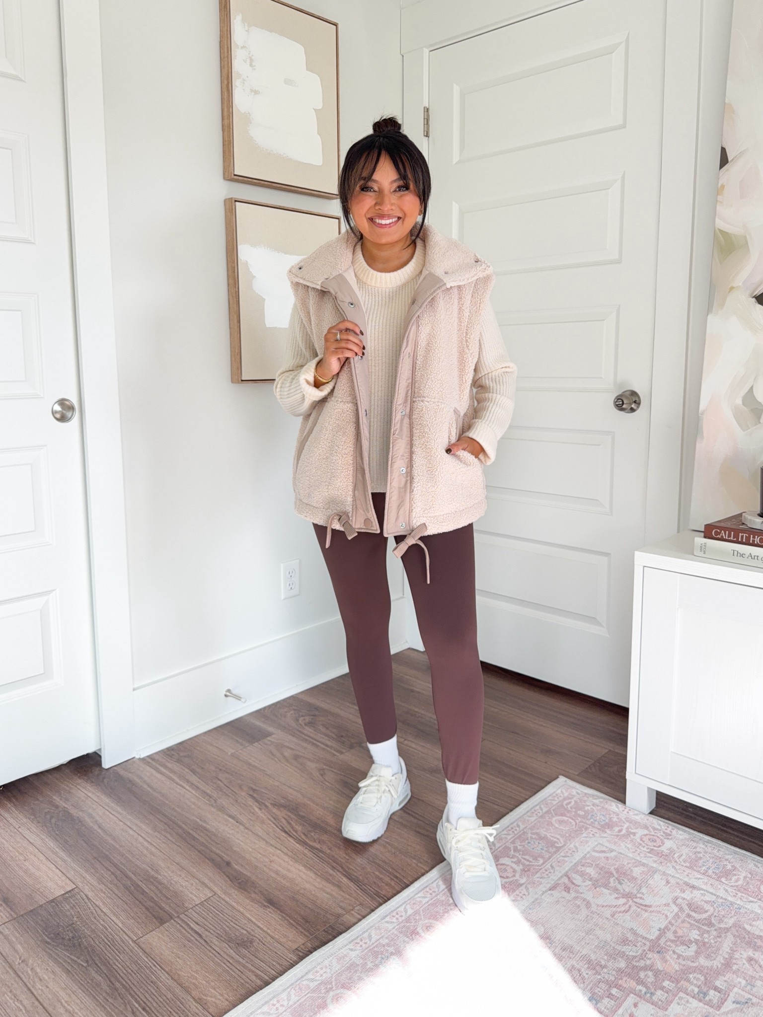 Tan taupe vest size xs TTS
Ivory sweater size xs TTS
Brown burgundy leggings size small TTS
Sneakers size 6.5 TTS 


#LTKPetite #LTKSaleAlert #LTKActive