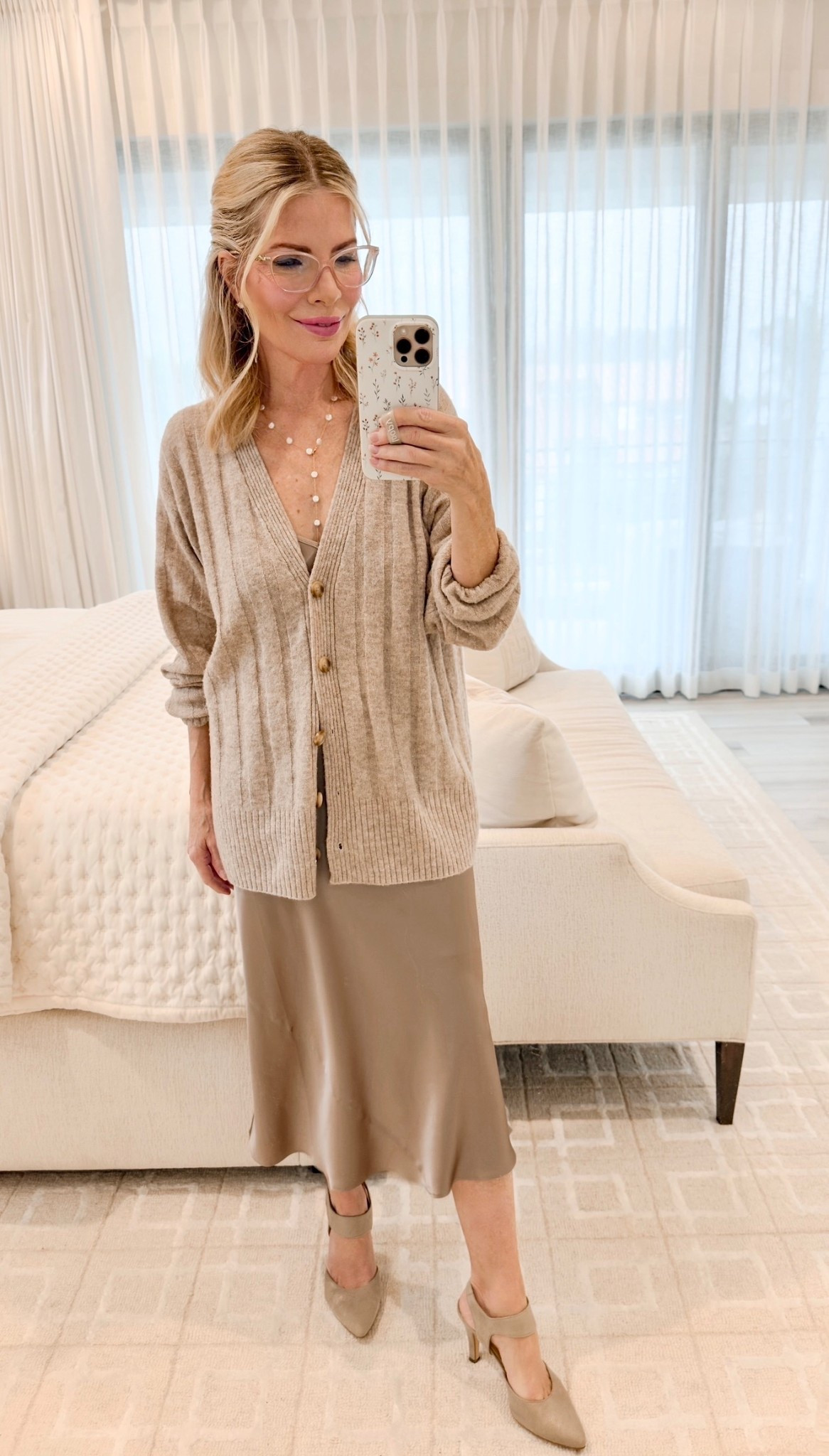 Gorgeous look for holiday party, date night and Christmas. 🤍  The sweater feels like cashmere without the price (I’m wearing the color Tan) and the dress is under $100. I’m wearing the color Morel Gray  Wearing a size Small in both  

#LTKHoliday #LTKFindsUnder100 #LTKParties