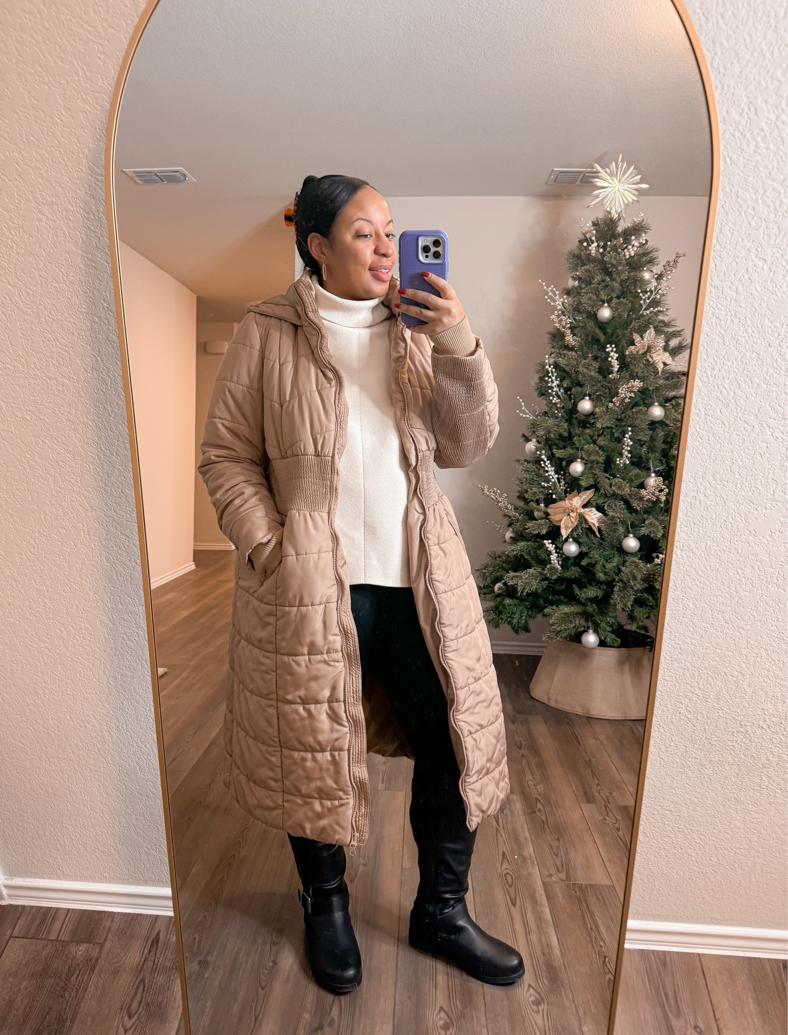 Oversized turtleneck sweater, black leggings, wide calf boots, long puffer coatts
