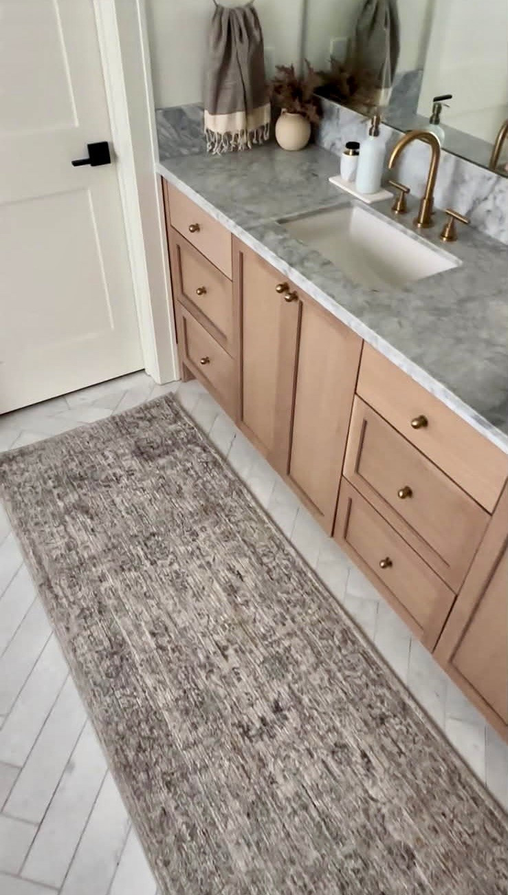 I’m linking the bathroom runner that adds softness, texture, and warmth to this space. The muted pattern works beautifully with marble, brass finishes, and light wood cabinetry.

I love using vintage-inspired runners in bathrooms because they make the room feel layered and finished while still being practical for everyday use. Shop the exact rug and a few similar favorites here.
@Wayfair 
@lowes 
@Walmart

#LTKU #LTKSaleAlert #LTKHome