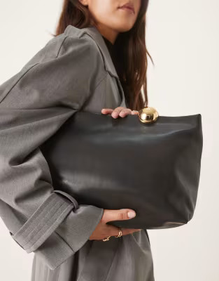 Mango large clutch bag with gold accent closure in black | ASOS (Global)