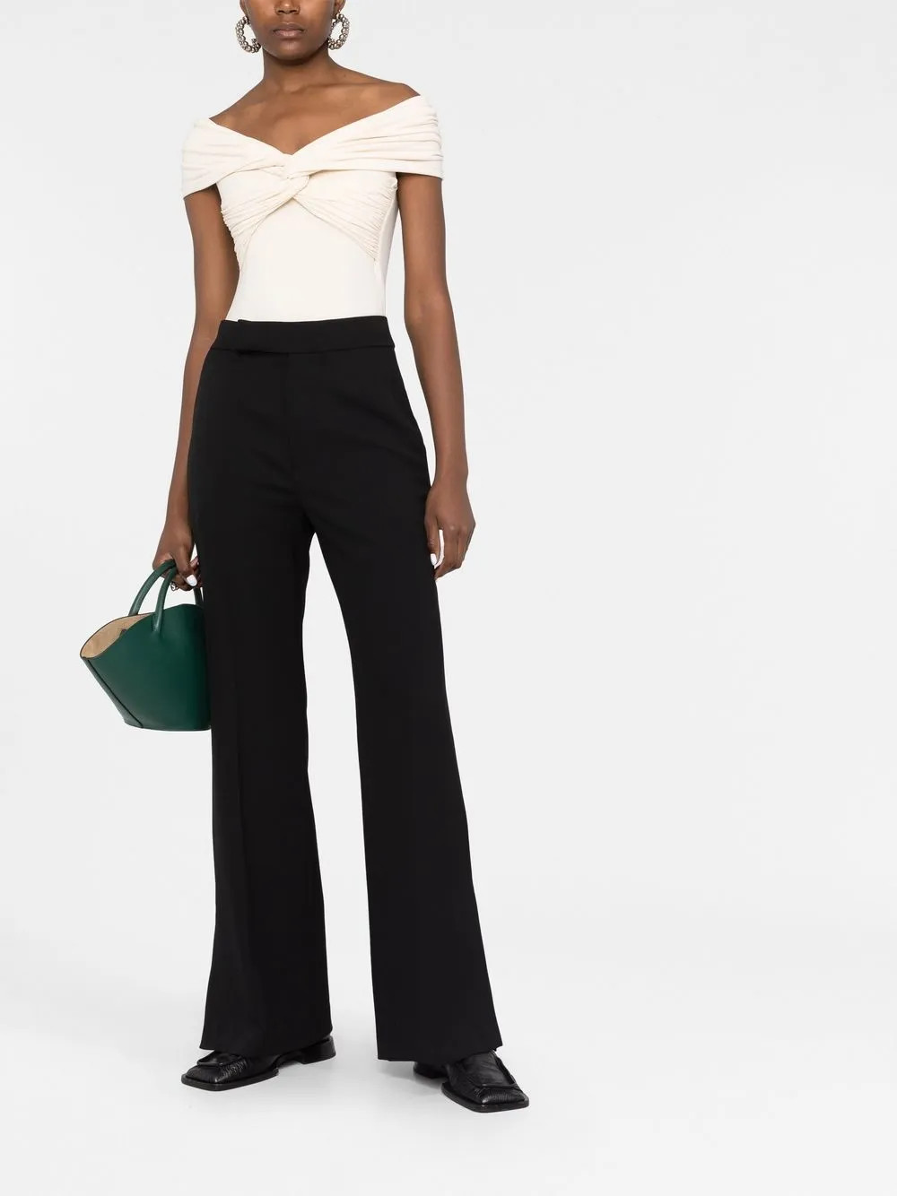 New SeasonLoulou Studioflared wool trousers | Farfetch Global
