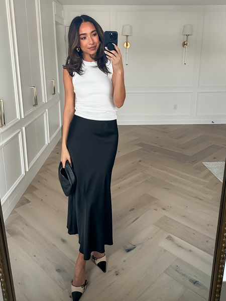 Spring capsule wardrobe: midi skirt 🖤 wearing size small tank and size small midi skirt, shoes fit tts 


Spring outfit 
Spring essentials
Closet staples
Closet essentials


#LTKfindsunder100 #LTKstyletip #LTKSeasonal