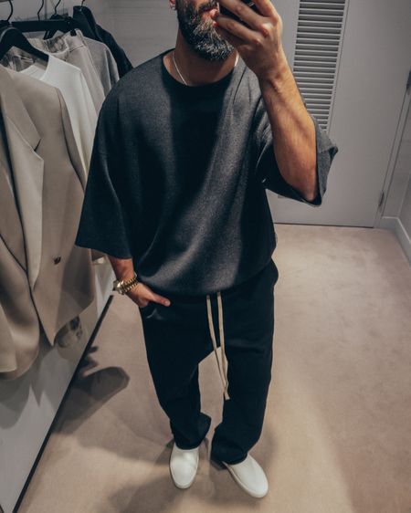 FEAR OF GOD Eternal Collection 3/4 Sleeve Wool Sweater in 'Black Heather’ (size M), Relaxed Cotton Jersey Sweatpants in ‘Black’ (size M), and California slides in ‘Greige’ (size 41). A relaxed and elevated men’s look that’s perfect for a casual Spring outing. Add a topcoat or blazer to dress it up and for added warmth. 

#LTKstyletip #LTKmens