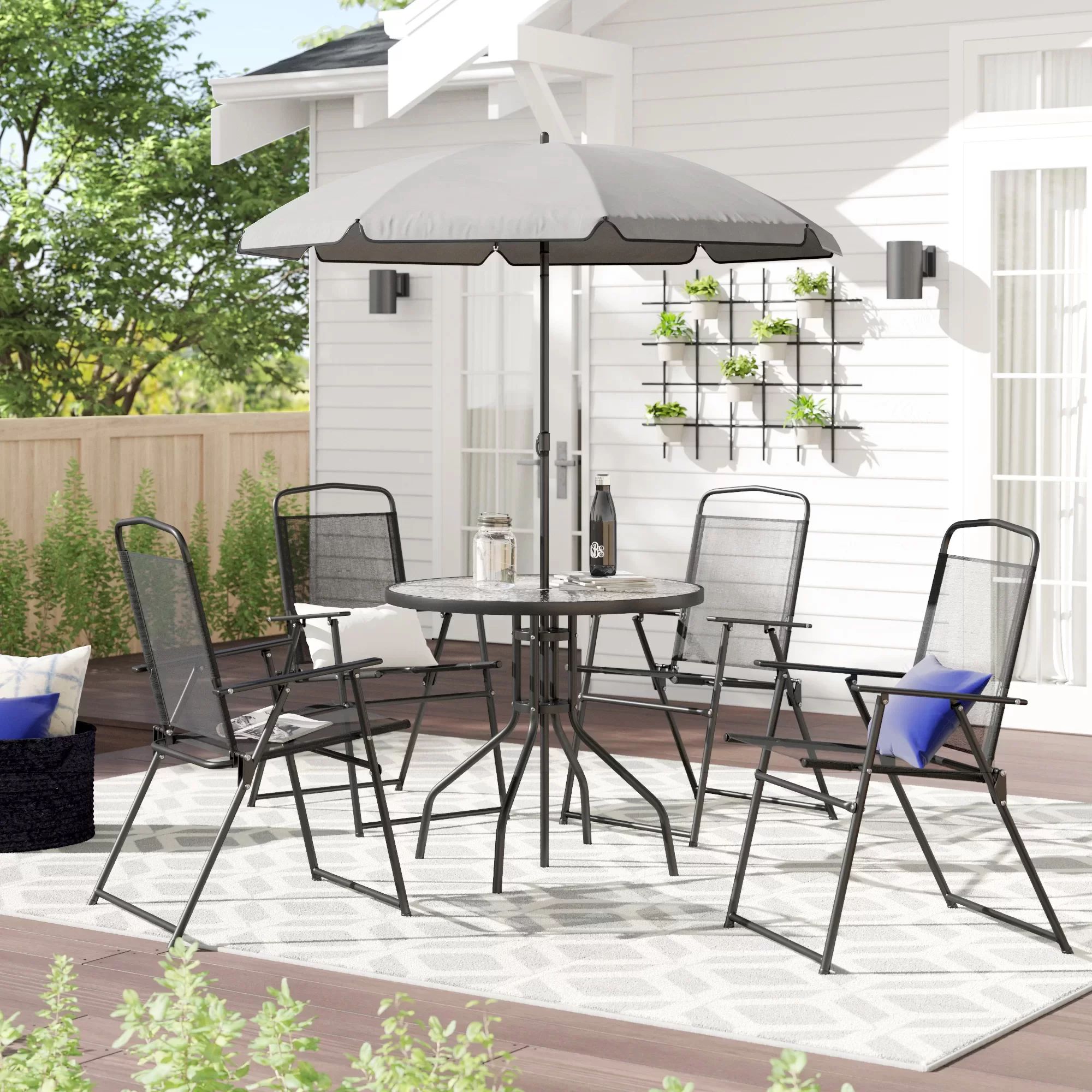 Anjae Round 4 - Person 31.25'' Long Dining Set with Umbrella | Wayfair North America