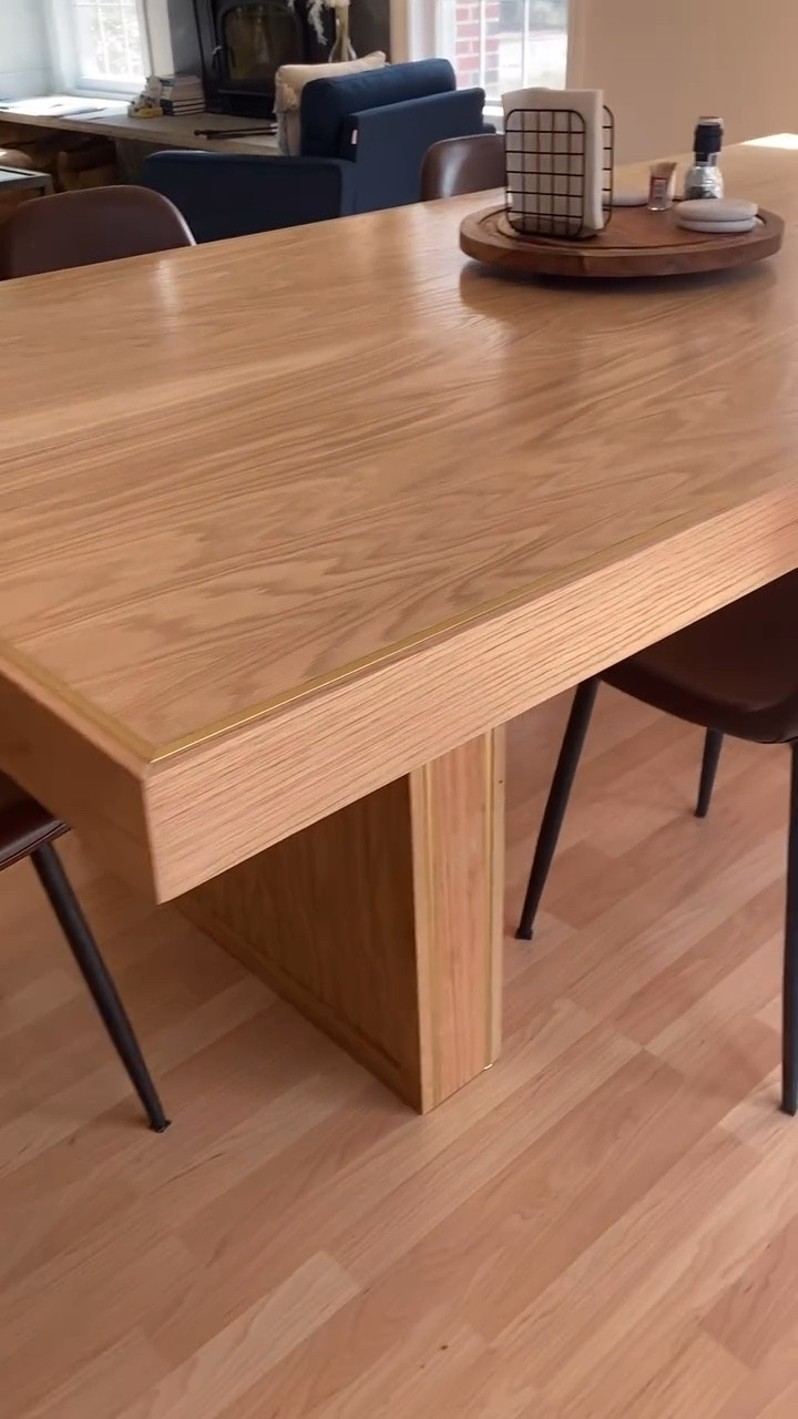 Here’s an idea to elevate a dining room table - I used tile edging in brass for these pretty inlays 😍 Made from red oak, still one of my favorite builds! comment LINK for the materials list

#diydiningtable #diyfurniture #diytable #diyhome #buildfurniture #custommade #woodworker