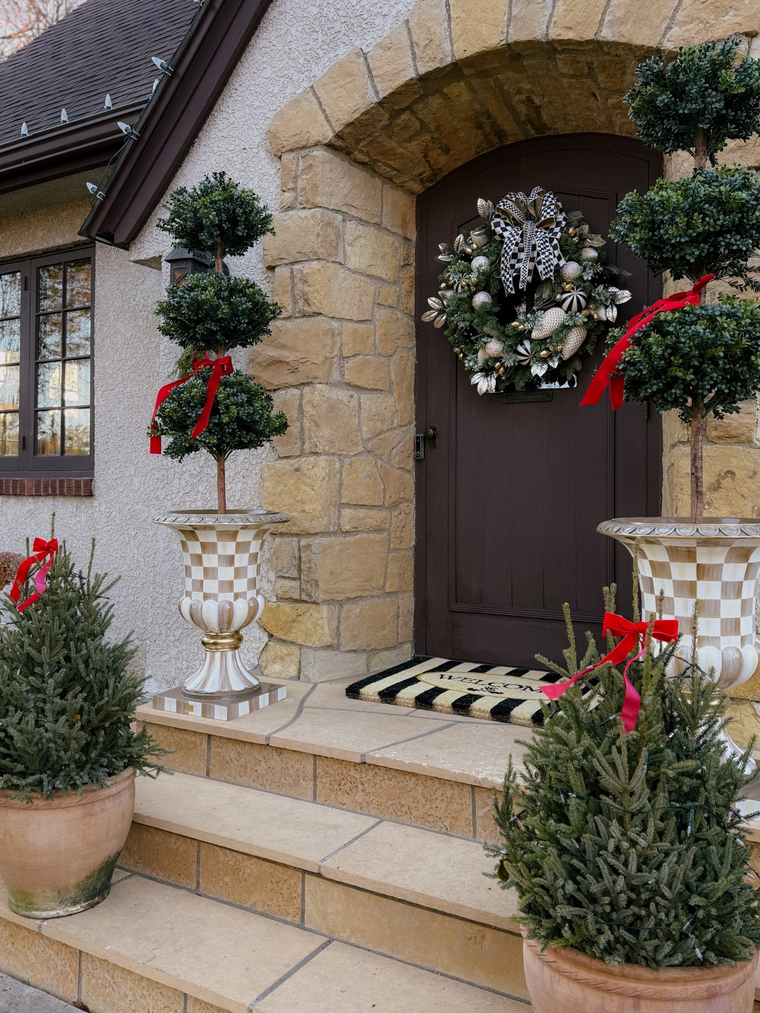 Holiday front steps. Use my code PATTICAKE20 for 20% off your MacKenzie-Childs order — until 8:30am EST tomorrow (11/21)! Quick if you’ve been eyeing something! 

#LTKHome #LTKHoliday