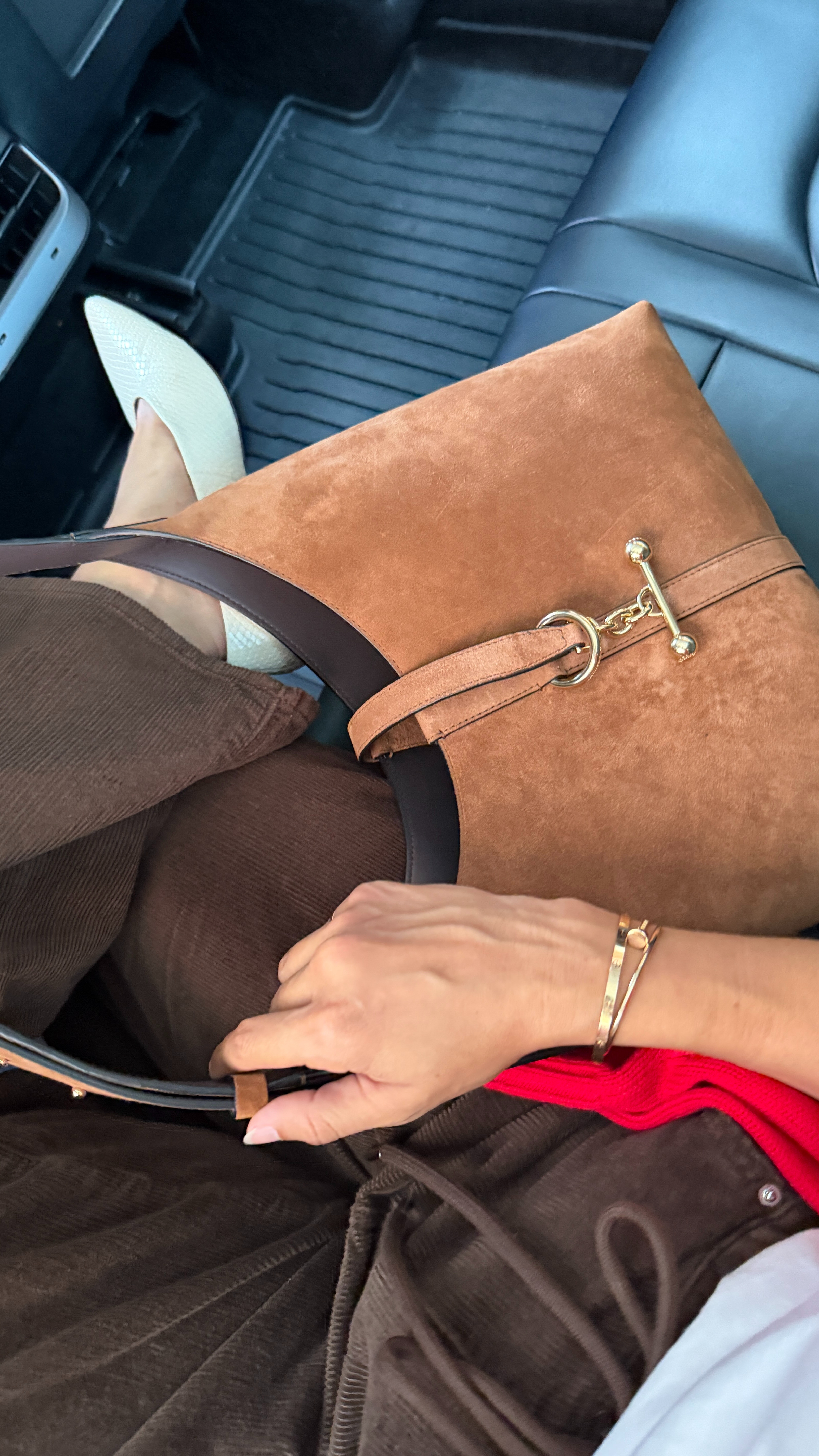 The perfect fall bag does exist. I love the rich cognac suede, oversized shape, and equestrian-inspired hardware on this one. It holds all of the essentials and looks especially chic paired with chocolate brown corduroy and creamy pointed-toe flats.  

 #LTKootd #LTKSeasonal