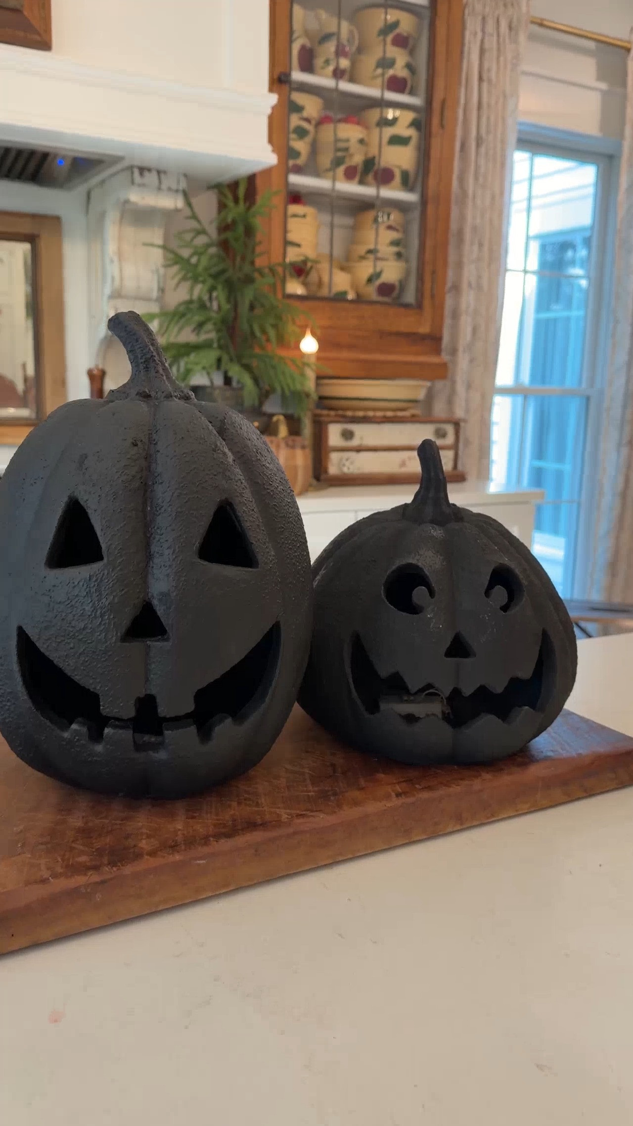 Halloween and Fall are a time when we like to add some bolder colors into our normally neutral home decor. I love the added contrast and texture from these black pre-lit jack-o-lanterns from Walmart.  

 #LTKSeasonal #LTKHome
