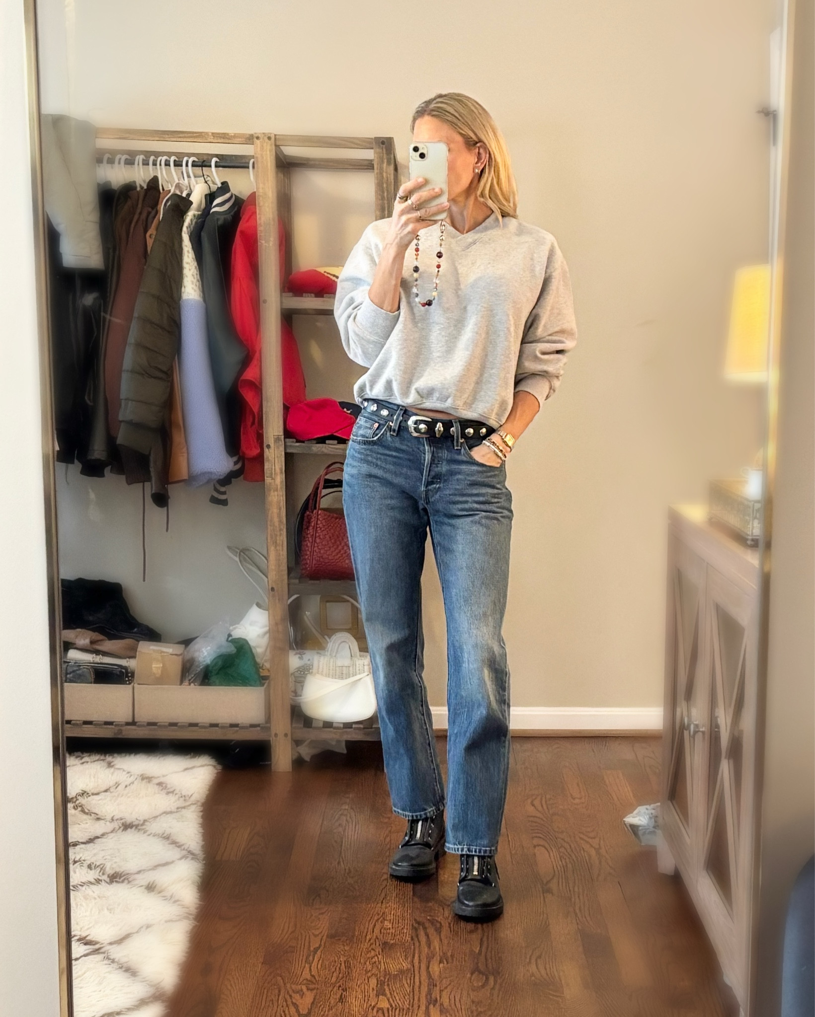 Another snow day 😡 is the perfect excuse to wear this vneck sweatshirt that looks like a sweater! Paired with classic Levi’s and my fave combat boots! 

#LTKOver40 #LTKootd