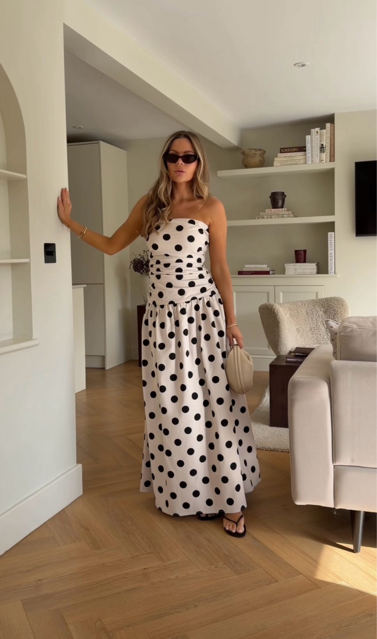 4th & Reckless strapless polka dot maxi dress, black and ivory polka dot print, bandeau neckline, ruched bodice, fitted waist, gathered skirt, flowing silhouette, full-length dress, elegant maxi dress, monochrome fashion, classic polka dots, vintage-inspired style, timeless wardrobe staple, feminine silhouette, chic occasion wear, wedding guest dress, garden party dress, European summer style, French Riviera aesthetic, coastal chic, quiet luxury, old money style, resort wear, holiday outfit, effortless elegance, minimalist styling, sophisticated fashion, statement print dress, modern classic, luxury-inspired look

I am wearing a size UK 8 and I am a standard uk 8, 5.4 height

#LTKspring #LTKsummer #LTKwedding