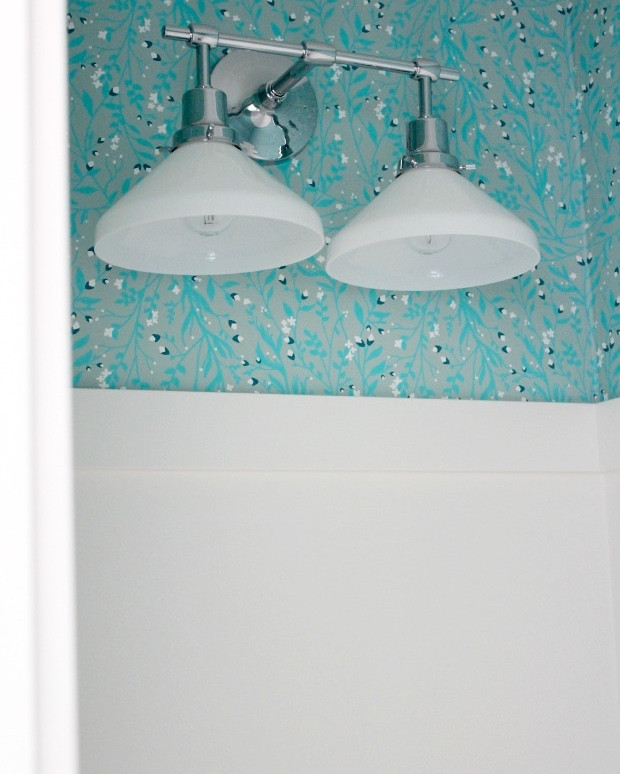 Don’t think you can hang wallpaper? It was easier than expected. We paired this pretty floral print with new trim and soft white paint to give our powder room a fresh new look. The double sconce with opal glass shades is so beautiful. Next up is installing the gorgeous pivot mirror I found on sale!

#LTKHome