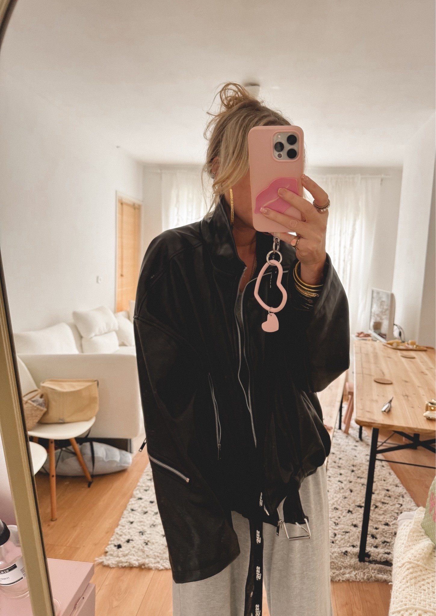 Hi Black bubble hem faux leather jacket!! love the black lightweight faux leather jackets we style these ones with so many fits 🫶🏻🫶🏻 love these extra zipper details and the bubble hem detail with belt detail. this oversized jacket we ordered in size L. xoxo

#LTKFashionMonth #LTKautumn #LTKstyletip