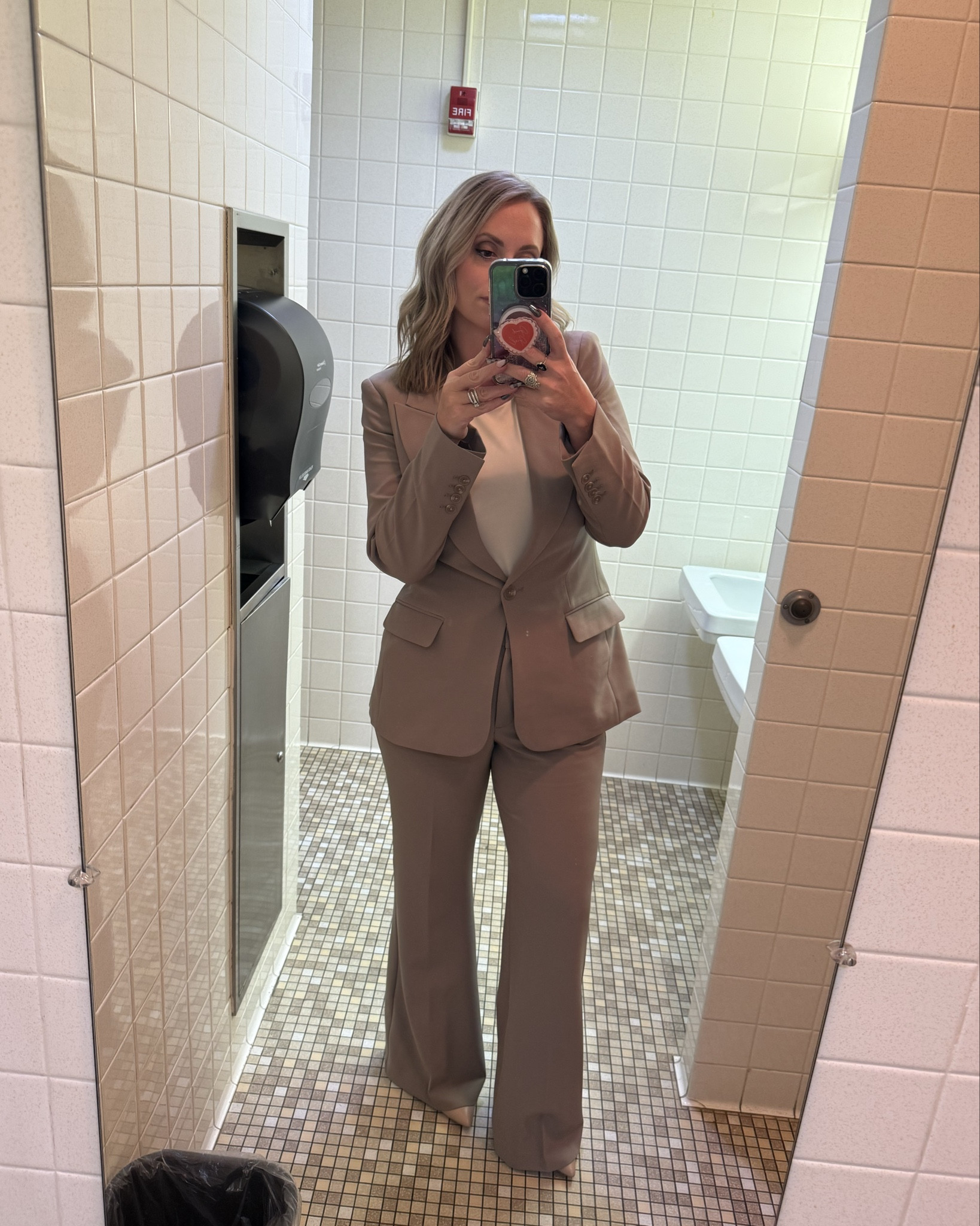 Great suit option from express! 
Wearing the medium in the mushroom blazer and size 10 in the high waisted flare trouser pants! 