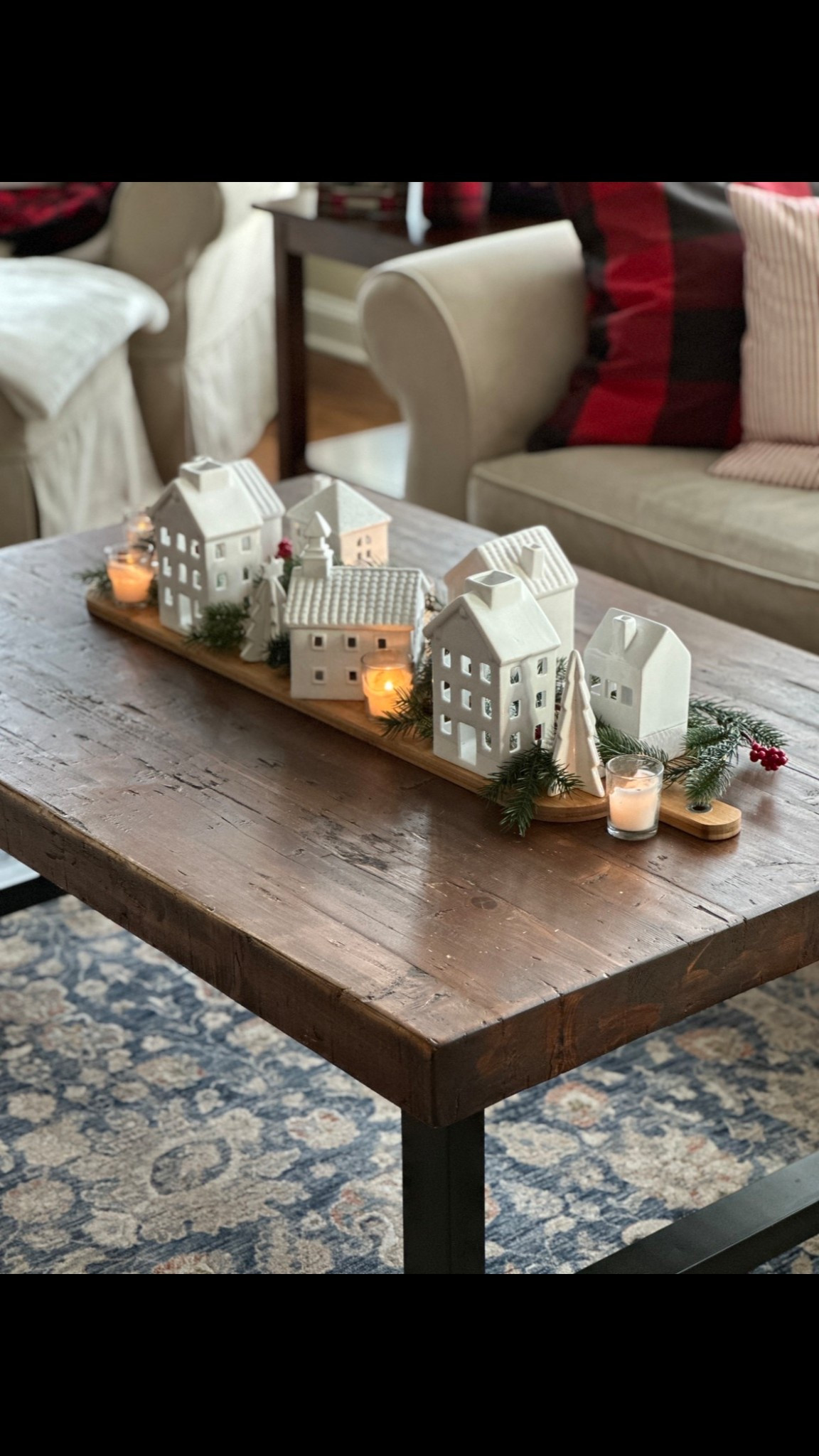 White ceramic houses and candles on a wooden bread board…the perfect Christmas centerpiece for a coffee table or dining table!

#LTKSeasonal #LTKHoliday #LTKHome
