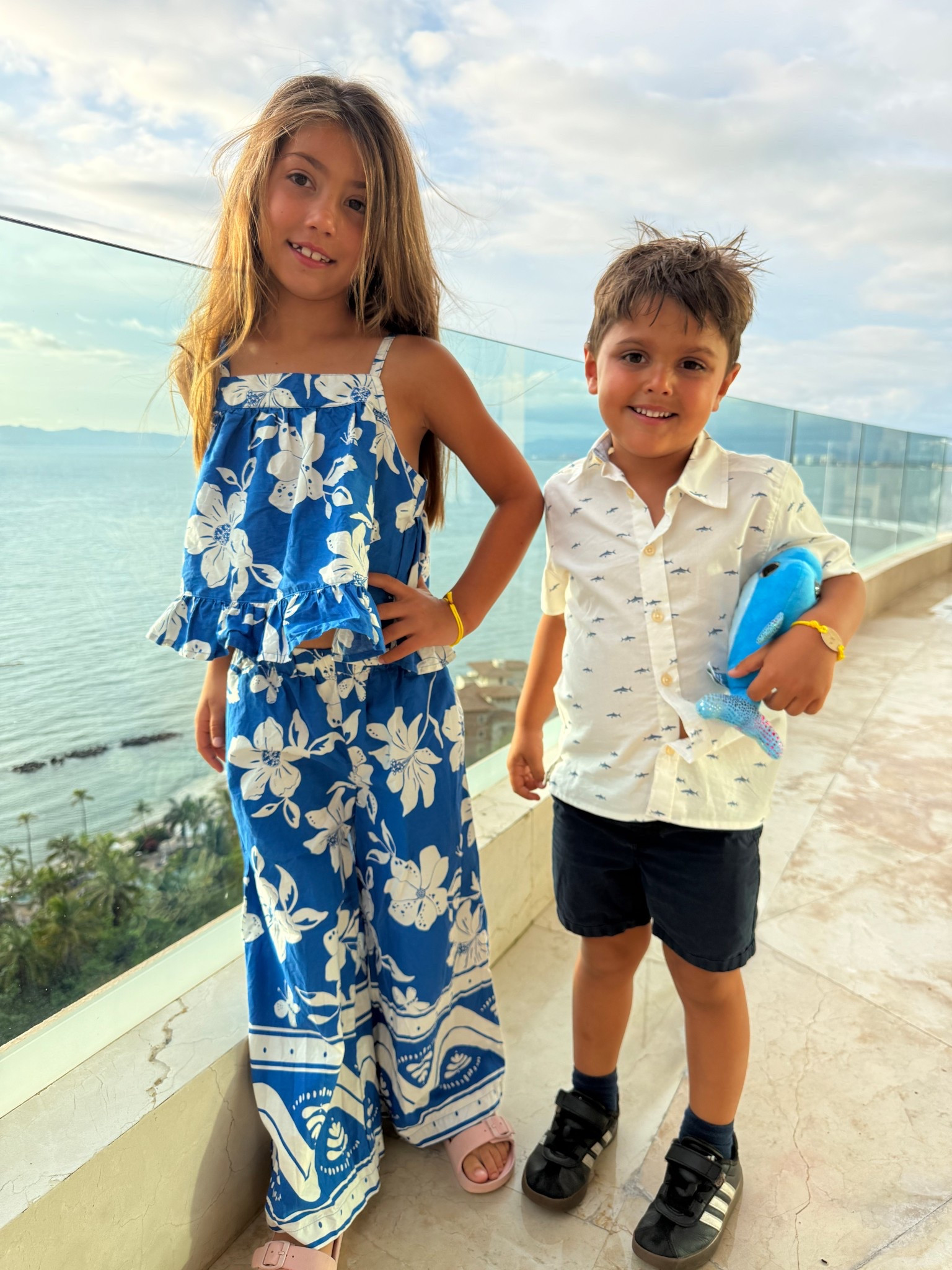 This blue set for Nadia is the perfect vacation set…it’s comfy, it breathes, and she wants to live in it! She’s wearing an 8, it’s true to size. Nicholas loves this shark shirt, it’s fun for him but looks nice enough to wear to dinner. 

#LTKFamily