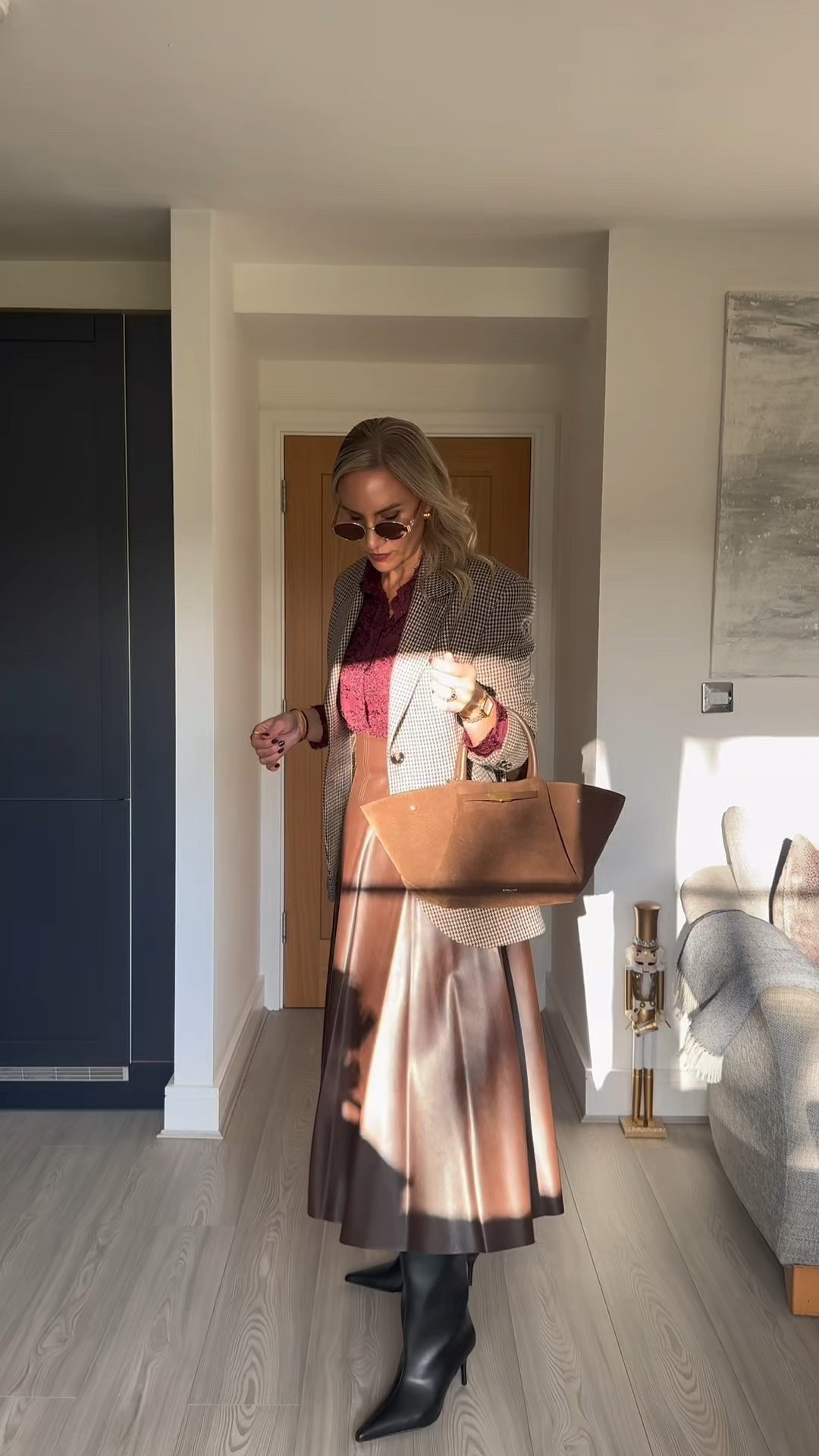 What I’m wearing to the office 🏢 

Brown leather midi skirt, burgundy embroidered shirt, black knee high boots, brown suede tote, gold statement earrings 🫶🏼

I’m wearing a size 10 in the skirt and a medium in the shirt. 

#LTKautumn #LTKworkwear #LTKstyletip