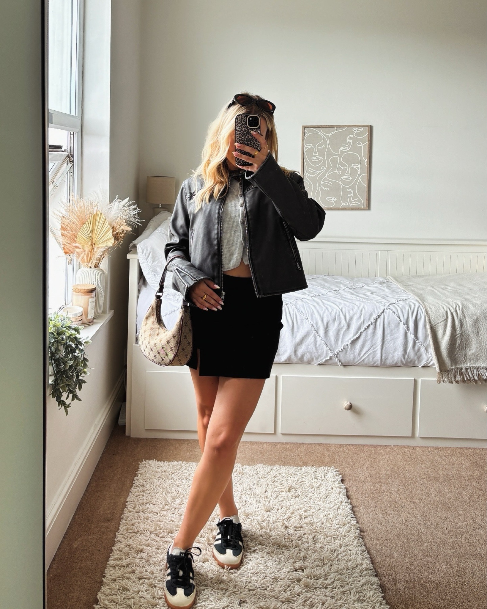 styling this gorge urban outfitters leather jacket 🩶 which is on sale!
an easy to put together outfit 
- primark grey knit vest 
- Stradivarius black skort 
- adidas trainers 
- mango bag

#LTKuk #LTKstyletip #LTKsale
