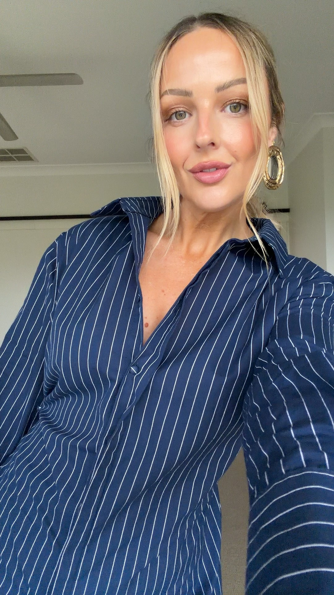 Pinstripe shirt dress and black capri pants 

#LTKaustralia #LTKover50style #LTKdatenight