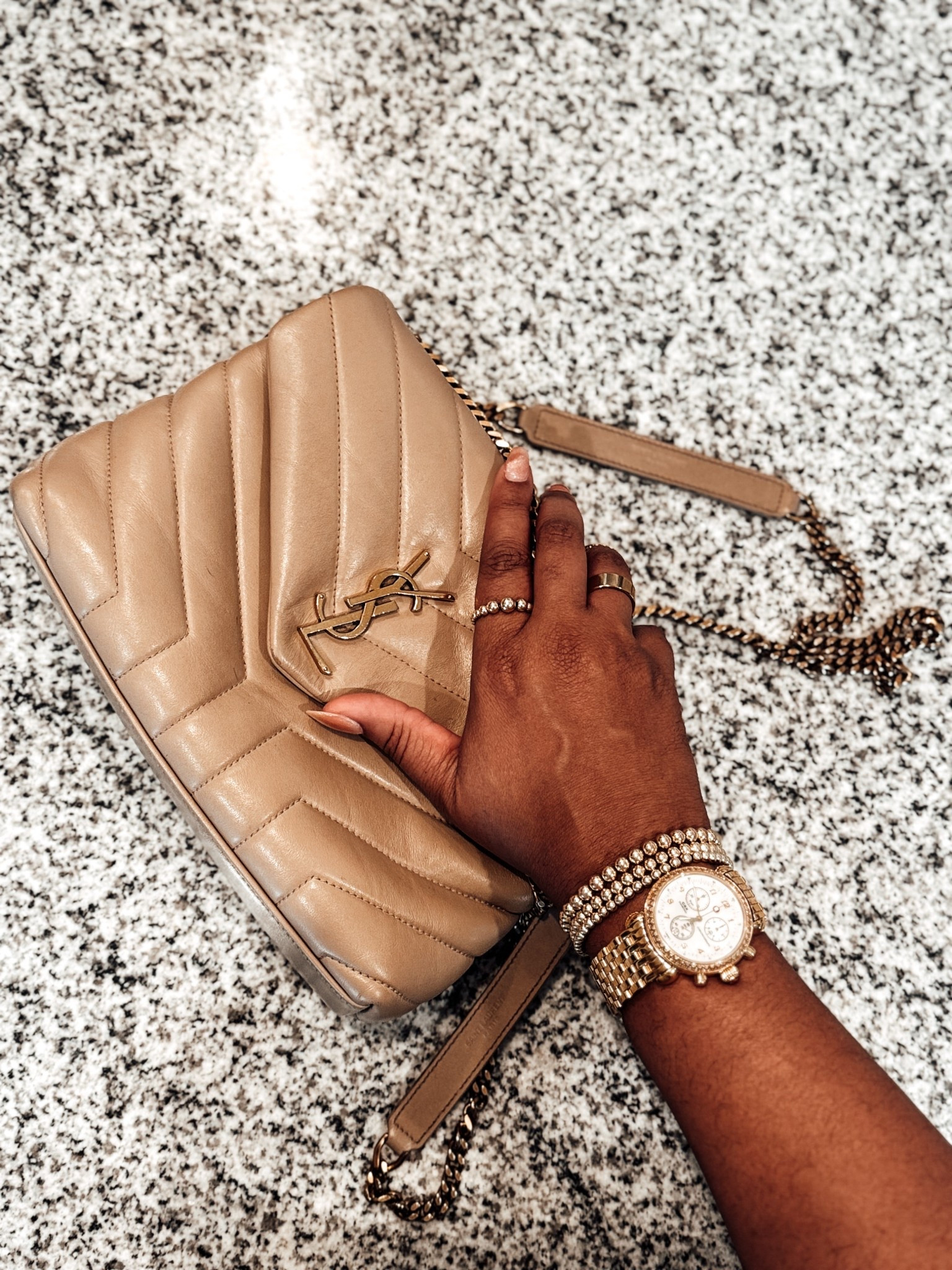 Saint Laurent Small Puffer Bag. 
Gold bracelet and jewelry watch stack. 

Scroll to shop. I’m so glad you’re here. 

#LTKBag

#LTKGiftGuide #LTKootd #LTKBeauty