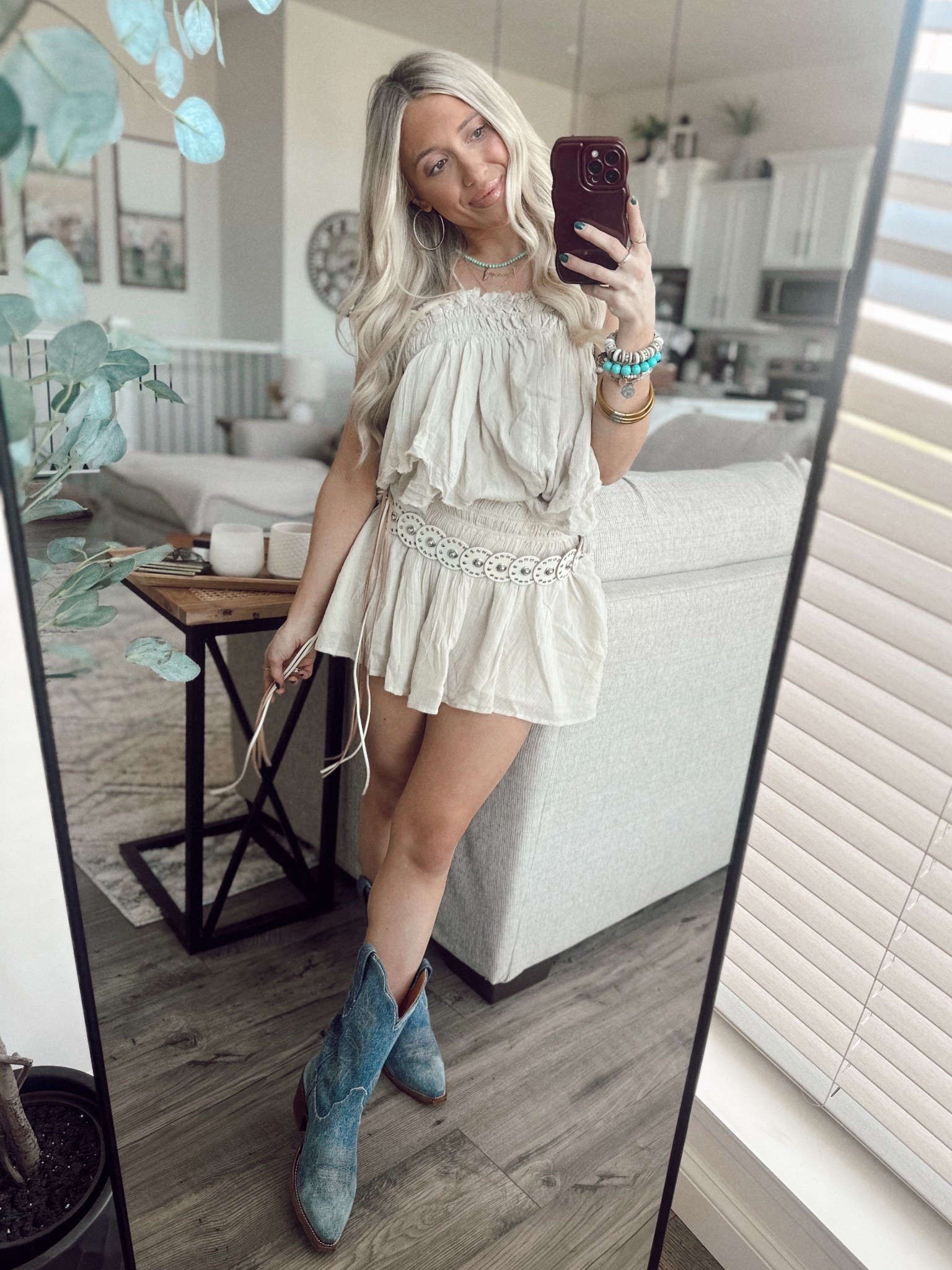 Serving up soft neutrals & cowgirl charm today! This ruffled mini set is the perfect blend of flirty and free-spirited, and these denim boots are giving all the rustic vibes. Styled it with chunky turquoise jewelry and a braided belt for that true Western-boho flair. 🫐🌾🌿🤠🧺✨ Soft neutrals + denim boots = the ultimate Western-boho combo.
This ruffled mini is lightweight, comfy, and so flattering. I paired it with denim cowgirl boots, a braided belt, and stacked turquoise jewelry to complete the look.

	•	Flowing
	•	Ruffled
	•	Western-inspired
	•	Boho-chic
	•	Earthy
	•	Feminine
	•	Playful
	•	Textured
#LTKSpringStyle #WesternBoho #CowgirlStyle #NeutralOutfit #BohoLook #WesternFashion #LTKSeasonal #LTKstyletip #TurquoiseJewelry #DenimBoots #LTKootd #LTKunder100 #WesternTrend

#LTKStyleTip #LTKFindsUnder100 #LTKShoeCrush